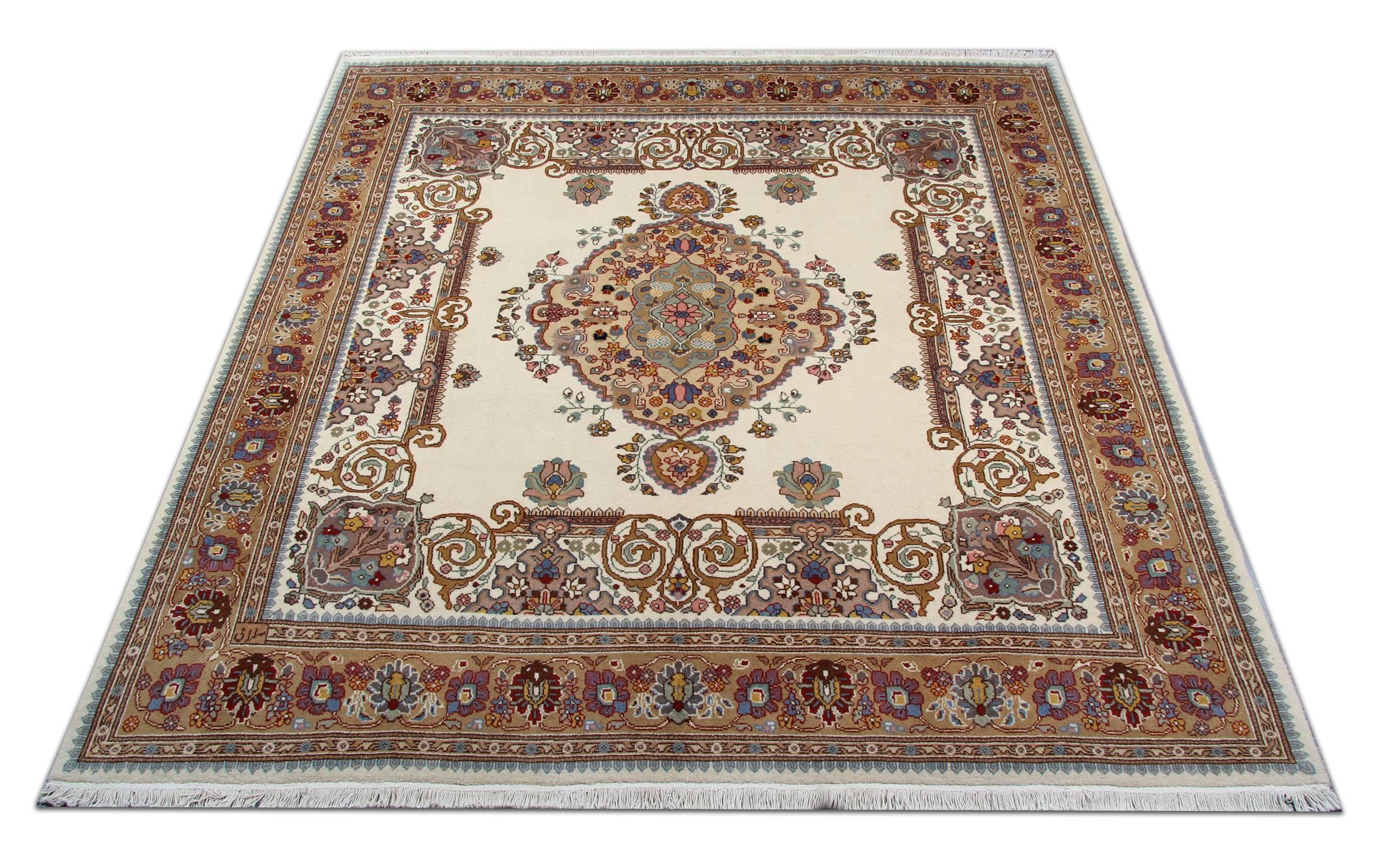 This unique wool rug has been woven with a fantastic neutral colour pallet. Cream and beige are the predominant background colours in this piece, decorated with amazing floral patterns woven in accents of muted green, blue, pink and yellow colours.