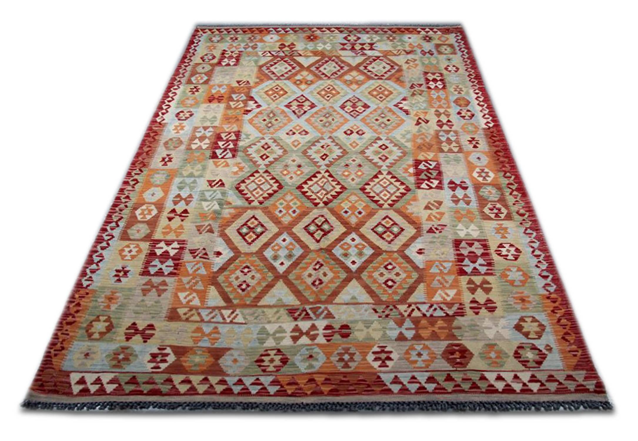 These kilim rugs are handmade in Afghanistan by Uzbek and Turkman tribes. This high-quality woven rug is made of wool and cotton. Plus, only organic dyes have been used for this tribal rug. The designs of these patterned rugs belong to the Persian