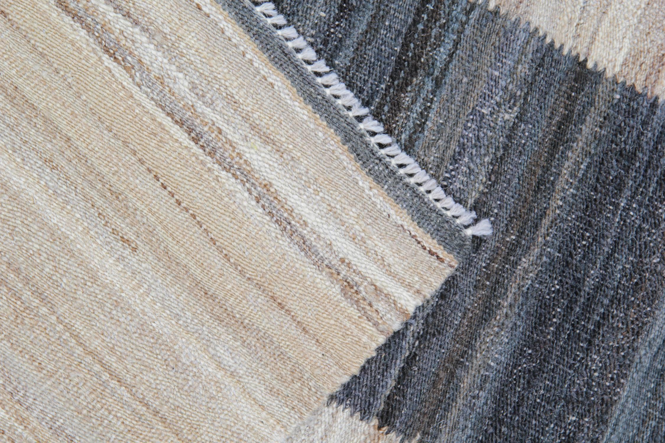 These contemporary rugs have been entirely hand woven in Afghanistan. The fibres and dyes are natural: No artificial dyes or chemicals have been used for these natural rugs. The brown rug and its earth colours of terracotta, beige and cream grab the