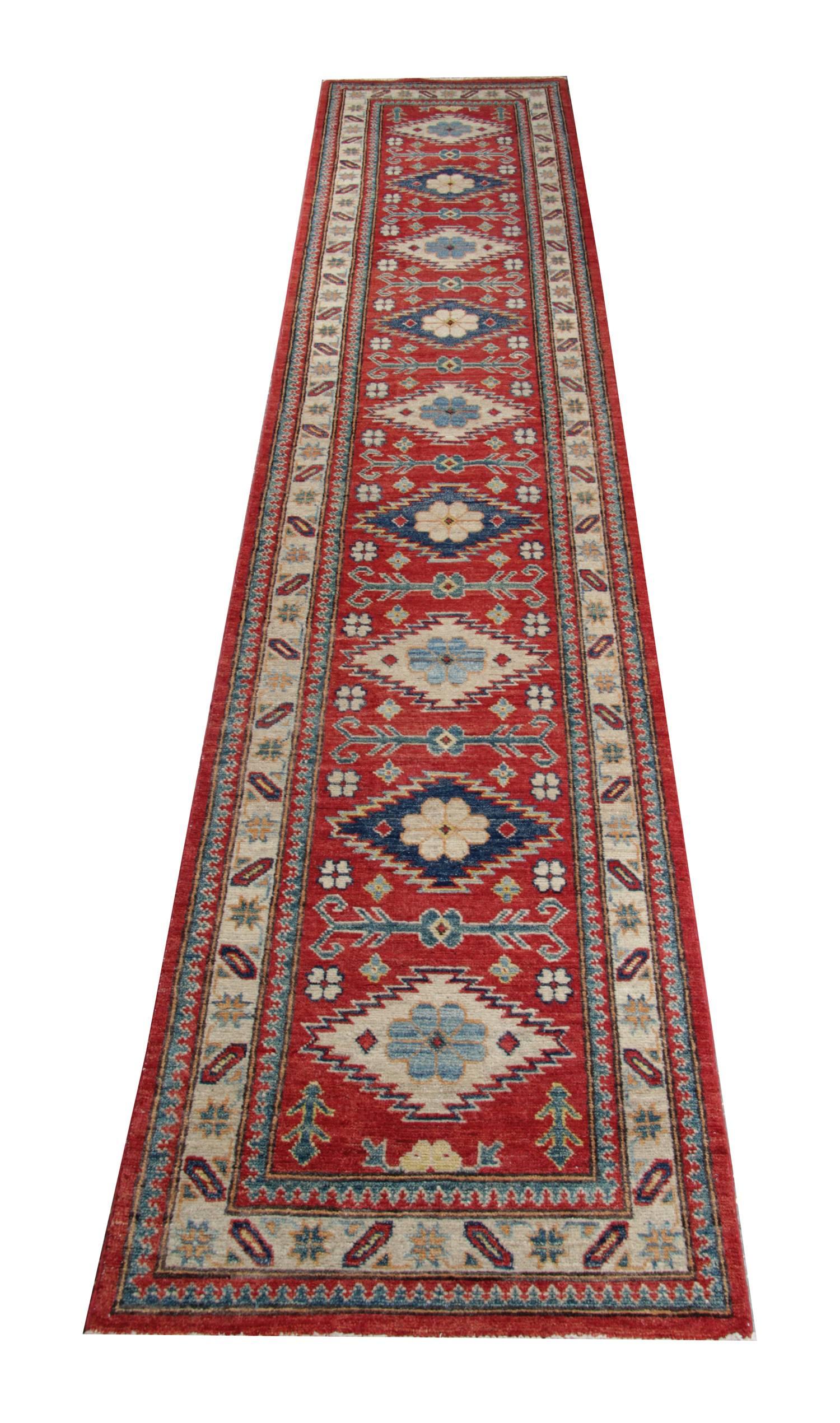 These handwoven new traditional rugs come in a striking color combination of the bright red rug style, navy, light blue, sea blue, cream and caramel. These new traditional handwoven runner rugs come from rug world in a striking color combination of