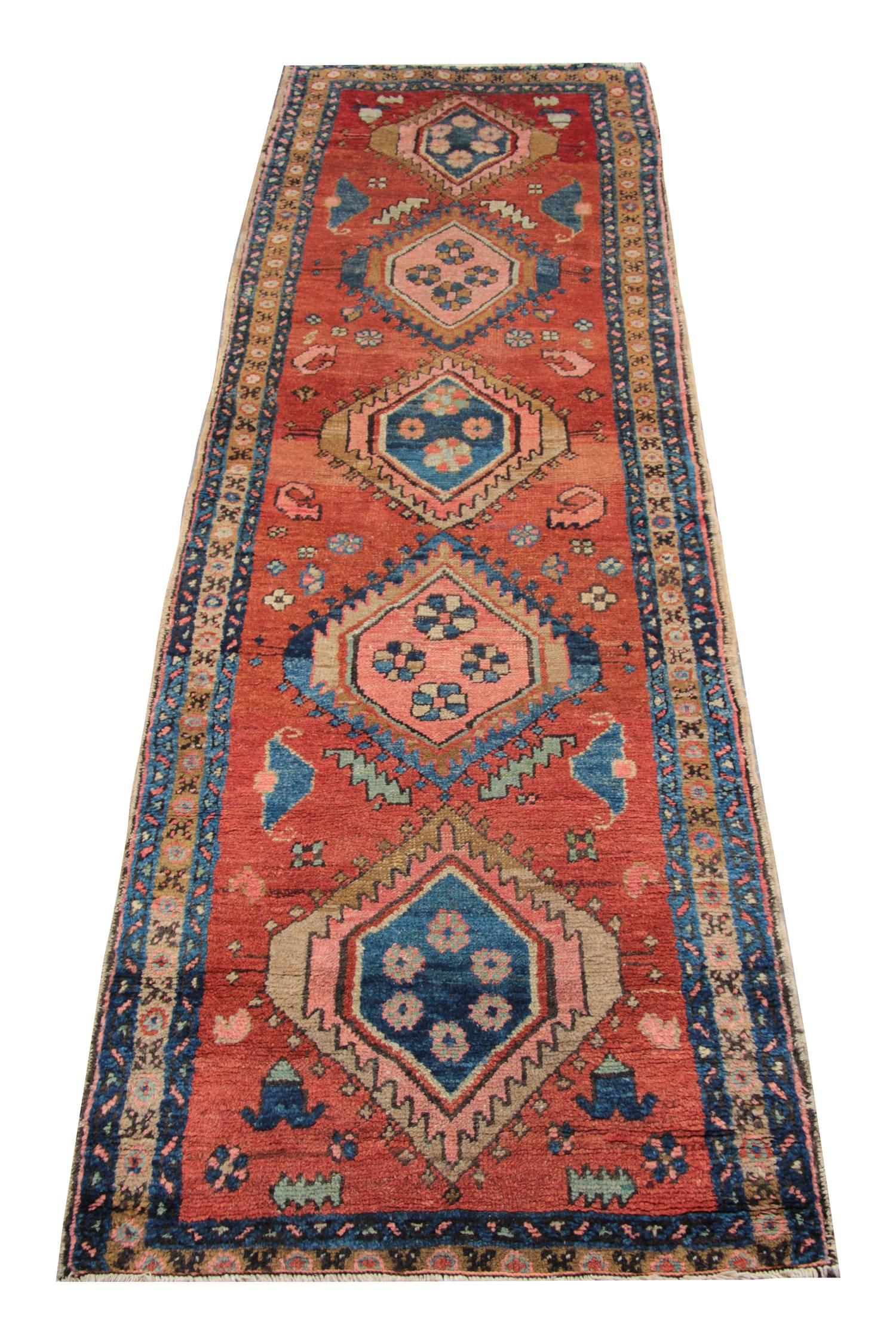Antique orange rug hand-knotted wool stair runners featuring alternating medallions with an all-over geometric rug design on an orange field. These hallway rugs surrounded by a yellow border with serrated tribal rug 's motifs from north-west of