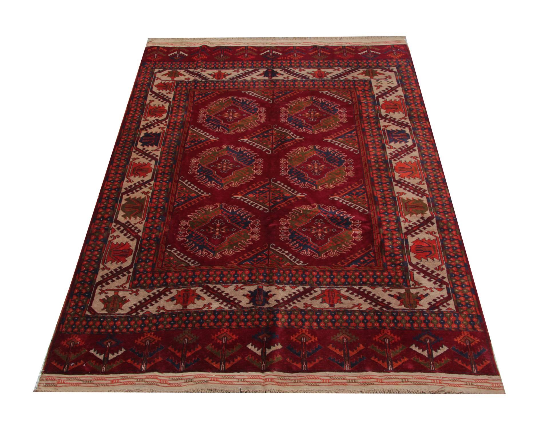 This antique Turkmen Youmot hand-woven wool rug was made using traditional vegetable dyes and handmade by the Turkmen tribespeople. This Rug is predominantly red in colour and has a repeated motif pattern covering the rug. This Antique rug would be