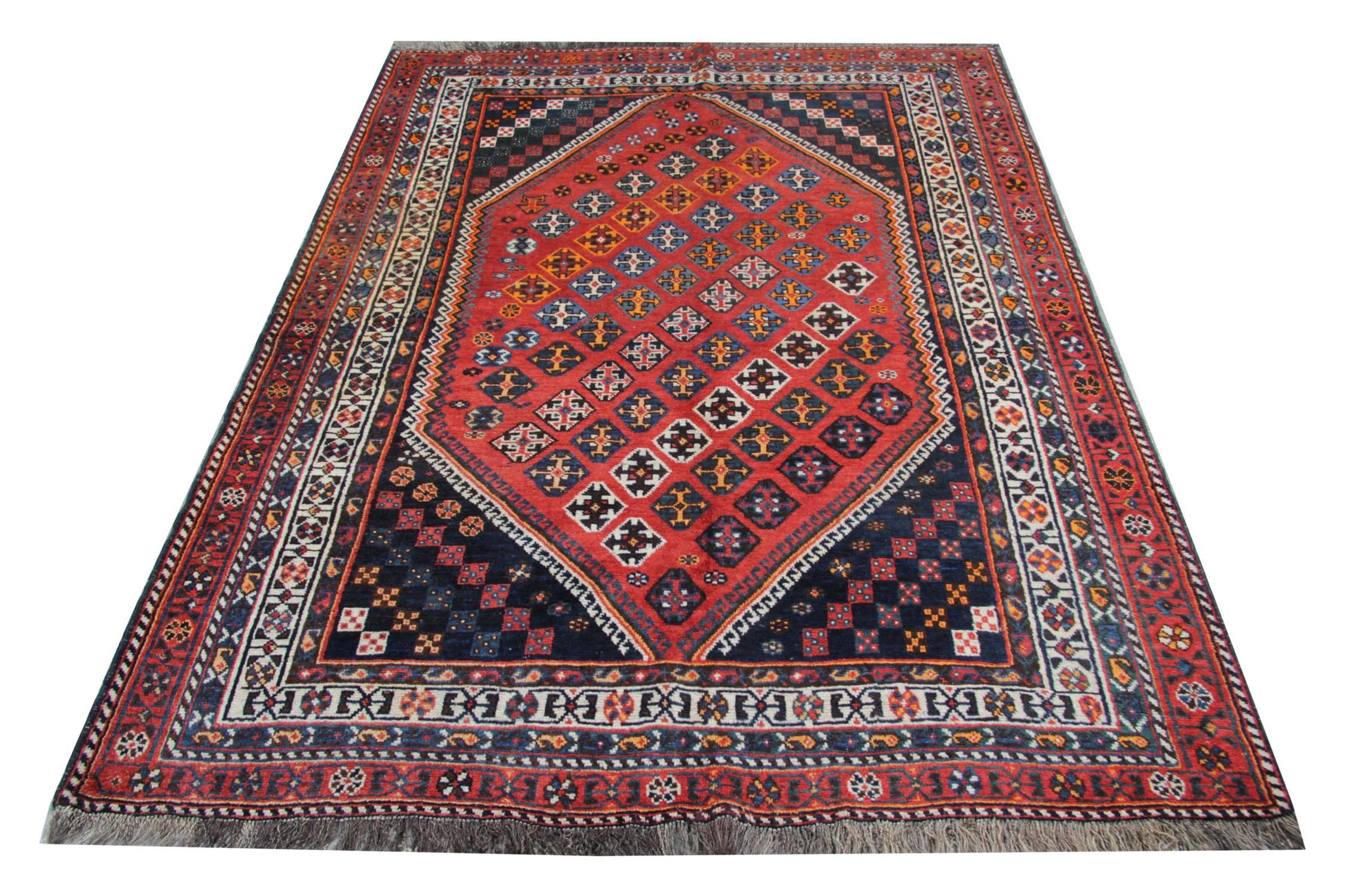 Lori handmade rugs are woven by the Lurs Tribe, which is a nomadic tribe in the mountainous Bakhtiyari region of Southwest Iran. This tribal rug is produced only with wool and it has a traditional geometric rug design. This red rug has an all over