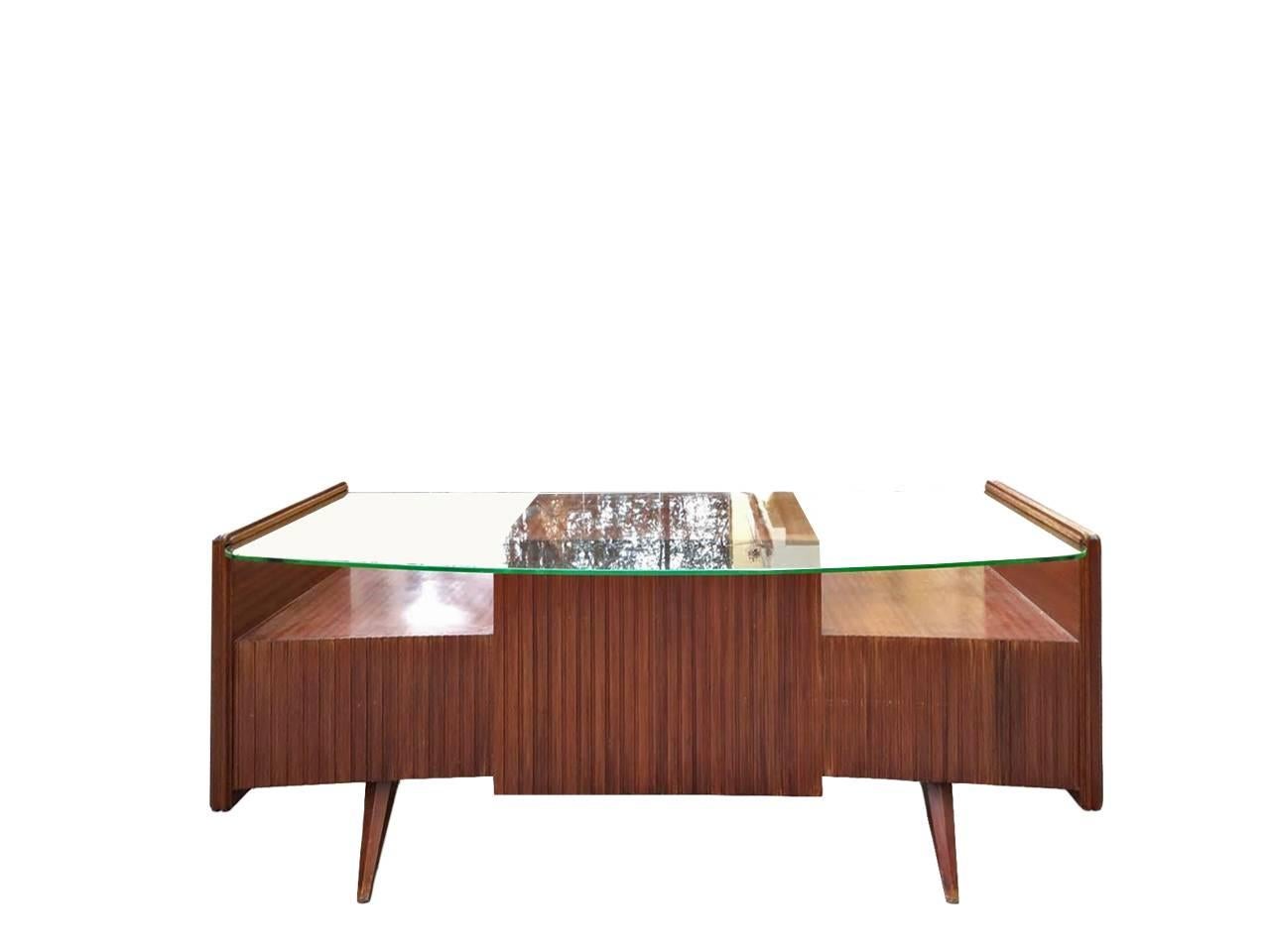 Curved desk, Design Vittorio Dassi, 1950. Beautiful rosewood desk, in restoration, the typical work of the architect Dassi.