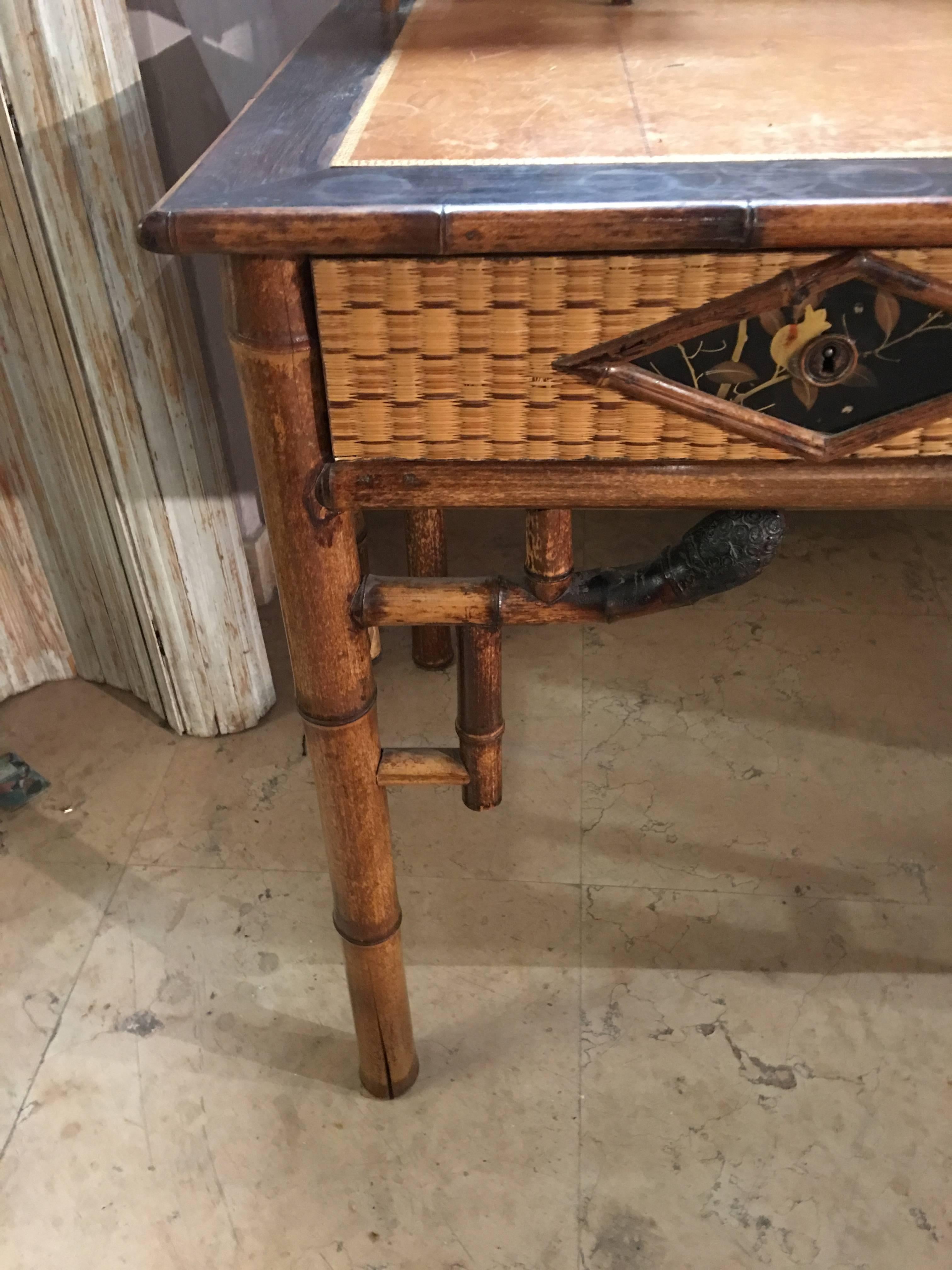 Beautiful bamboo writing desk, France, 1920
Bamboo trim in good condition to be restored, leather top to be restored, great for the rest of the parts.