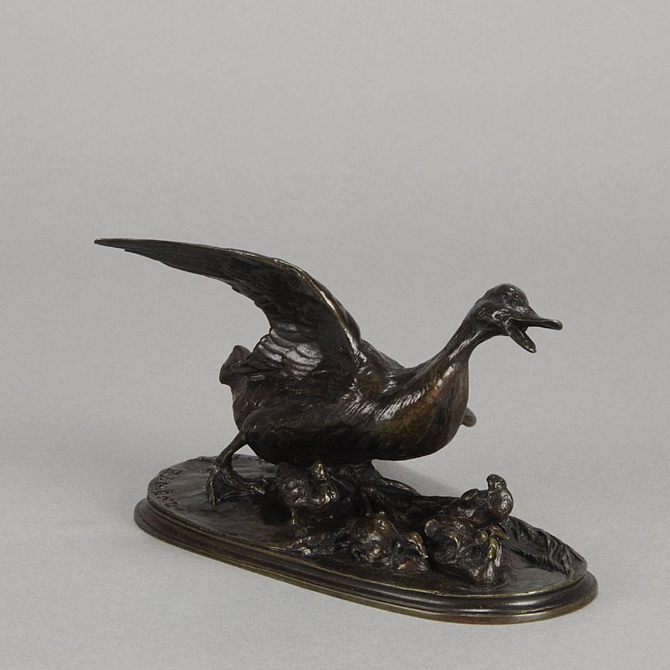 A fabulous bronze figural group study of a family of duck and ducklings with rich brown patina and excellent hand chased surface detail, raised on naturalistic base and signed P J Mêne