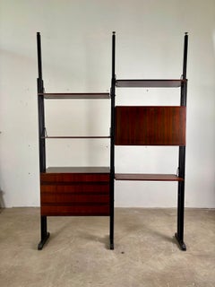 Modular wooden bookshelf, 1960s, Italy