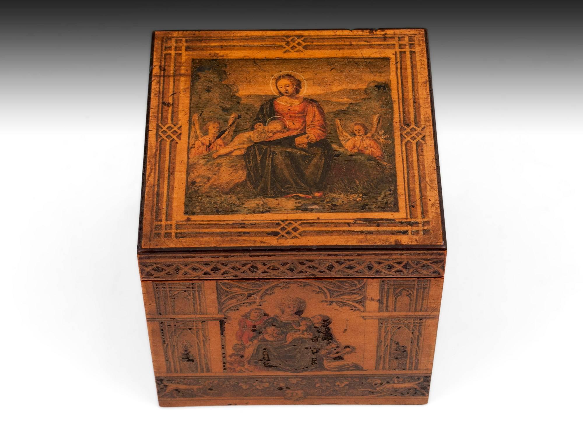 Antique tea caddy with each side finely painted depicting various scenes of angels and other religious iconography.