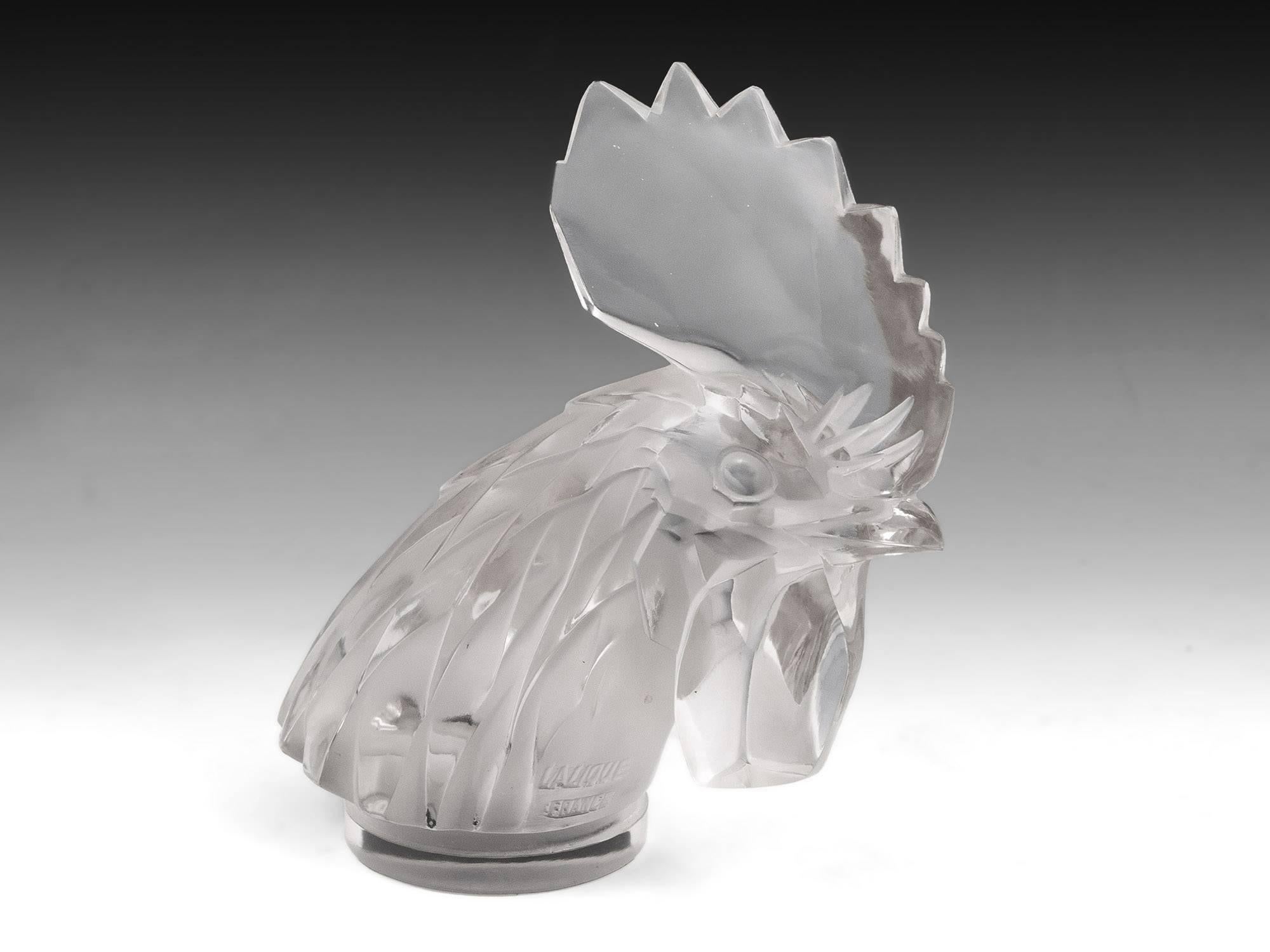 Lalique Tete de Coq / cockerel's head car mascot. Model number 1137 

These wonderful glass Lalique car mascots were originally made as car hood ornaments in the 1920's by famous glass make René Jules Lalique, who started a company using his own