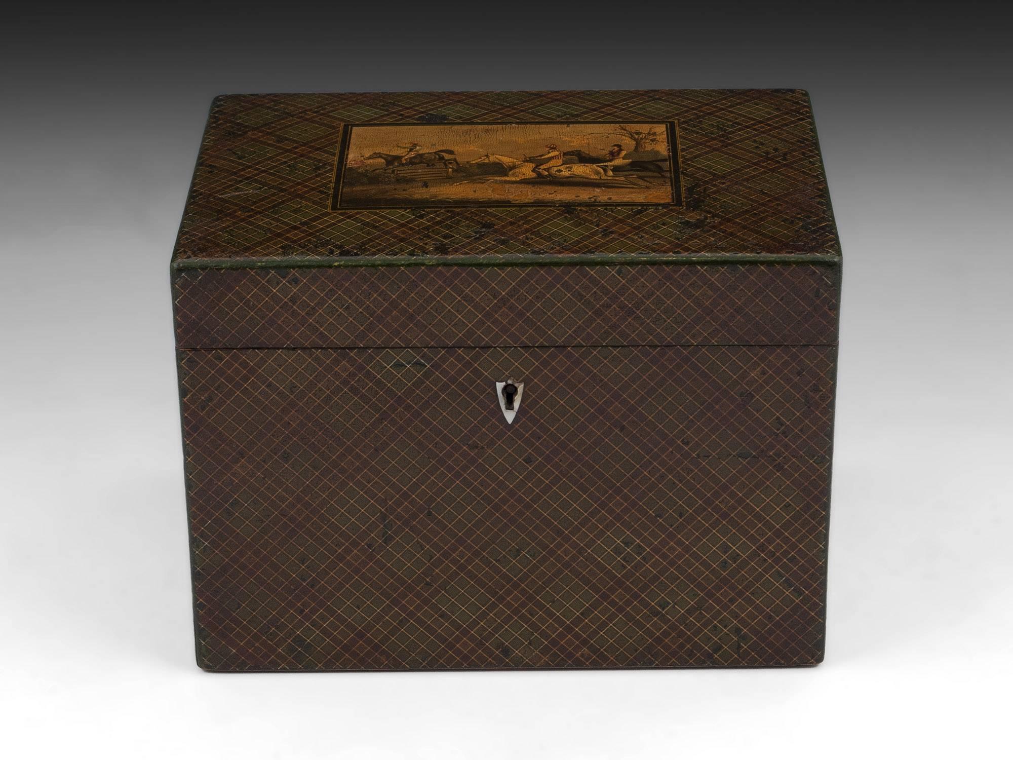Antique Green Tartan Ware Tea Caddy with a detailed painted scene of a cross country horse race / Steeple Chase to the top. The interior of the Tartan Ware tea caddy contains traces of the original foil lining the lid. The heart shaped escutcheon to