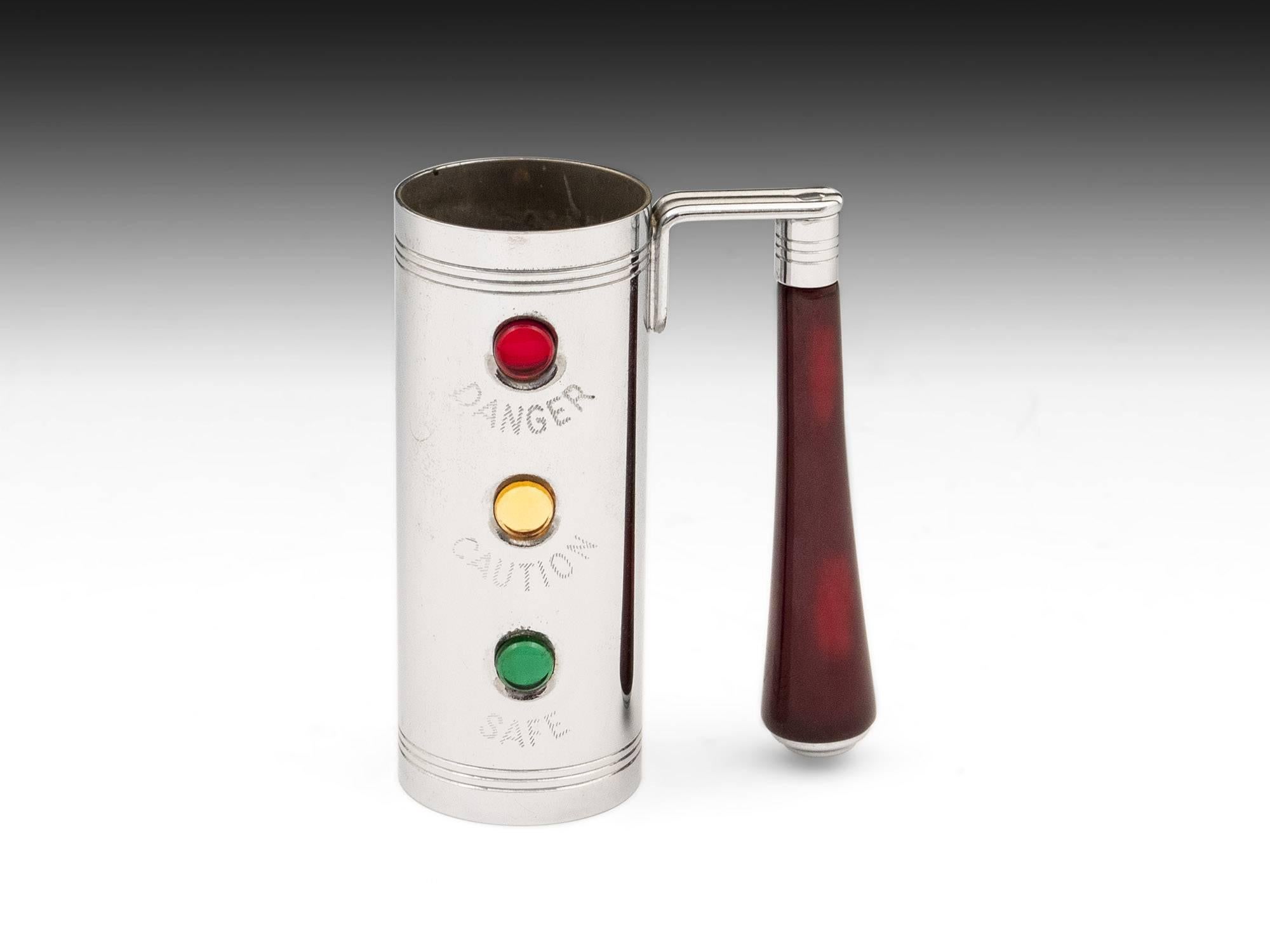 Novelty traffic light bar set By Glo Hill of Canada. Comprising a two chrome cylindrical Jiggers, one with a deep red bakelite handle, the other with an unusual bakelite golf club handle. Along with a bottle opener with another golf club style