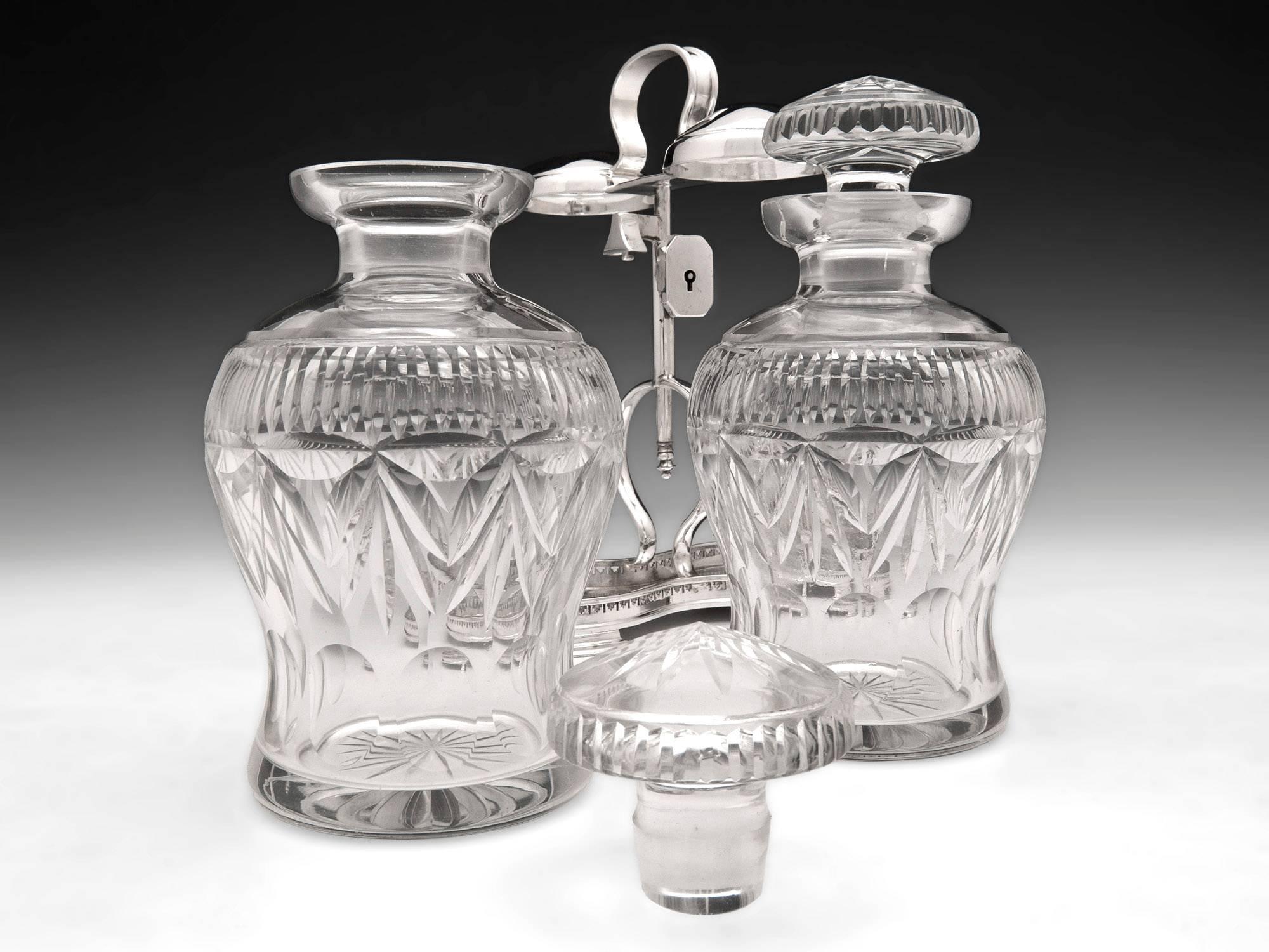 British Silver Plated Spin Top Cut Glass Tantalus Decanters