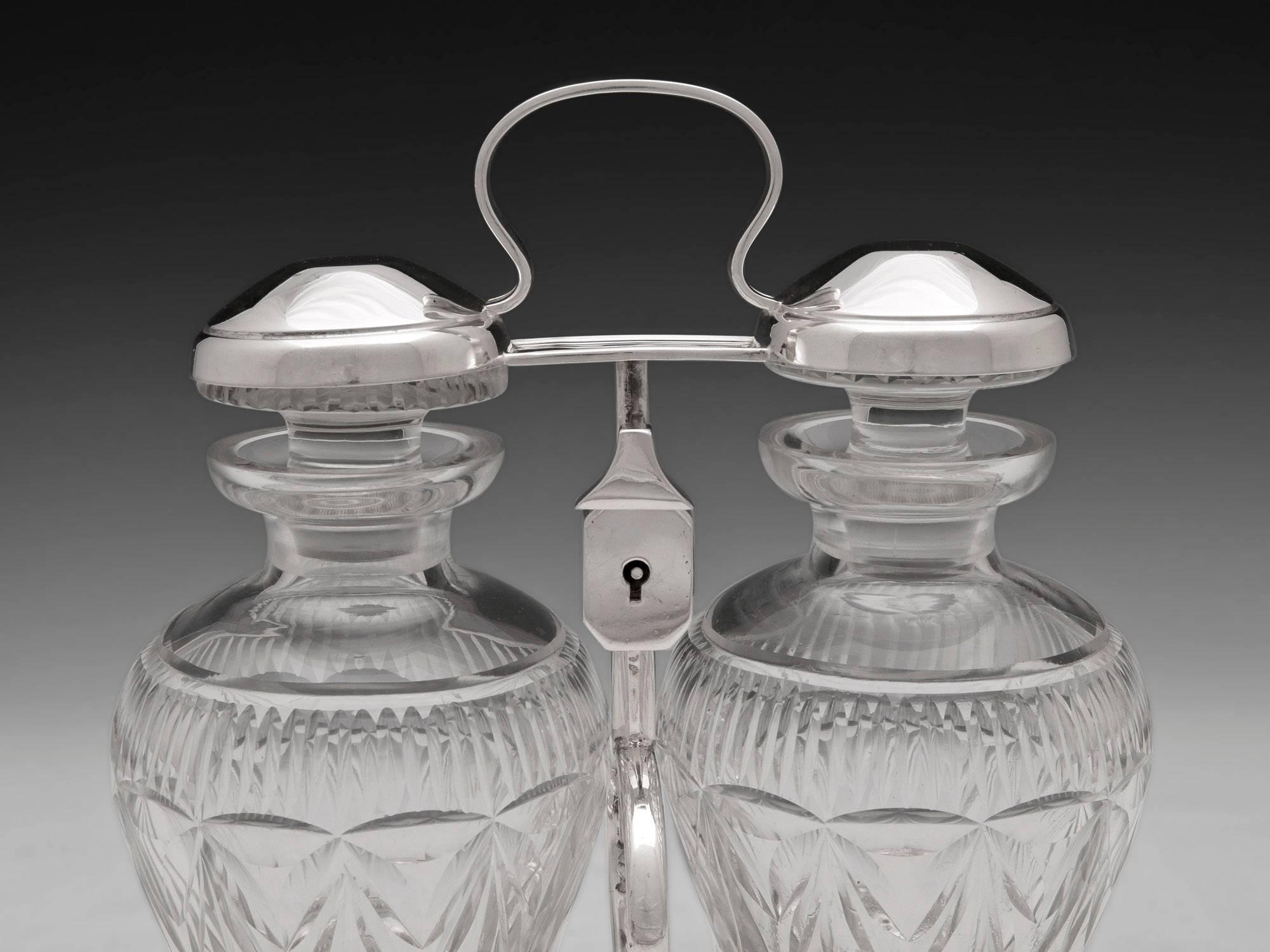 20th Century Silver Plated Spin Top Cut Glass Tantalus Decanters