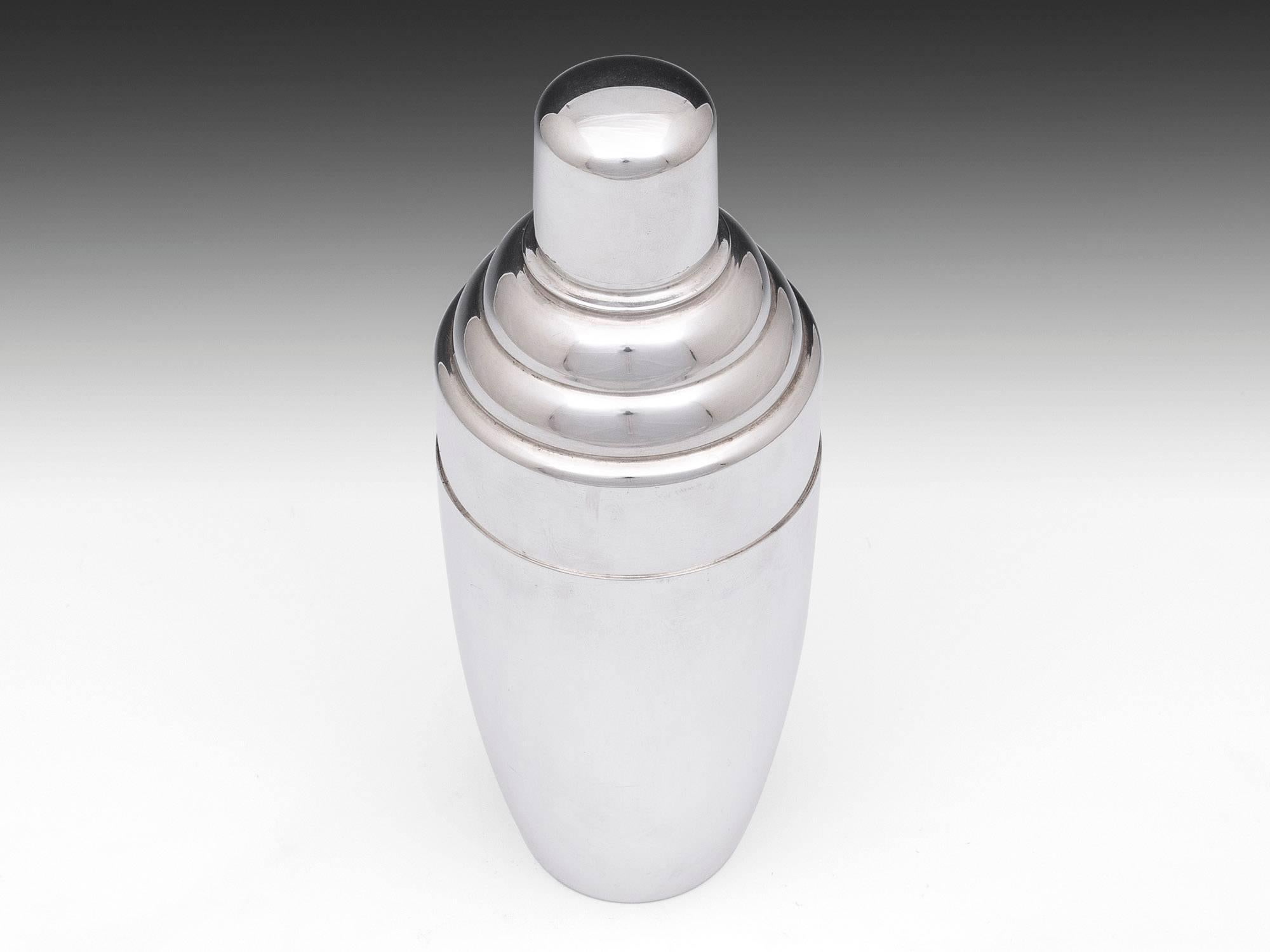 Art Deco silver plated cocktail shaker with step shoulder design. The underside has a makers mark which reads: 
Gaskell & Chambers Made in England E.P.N.S B'Ham 