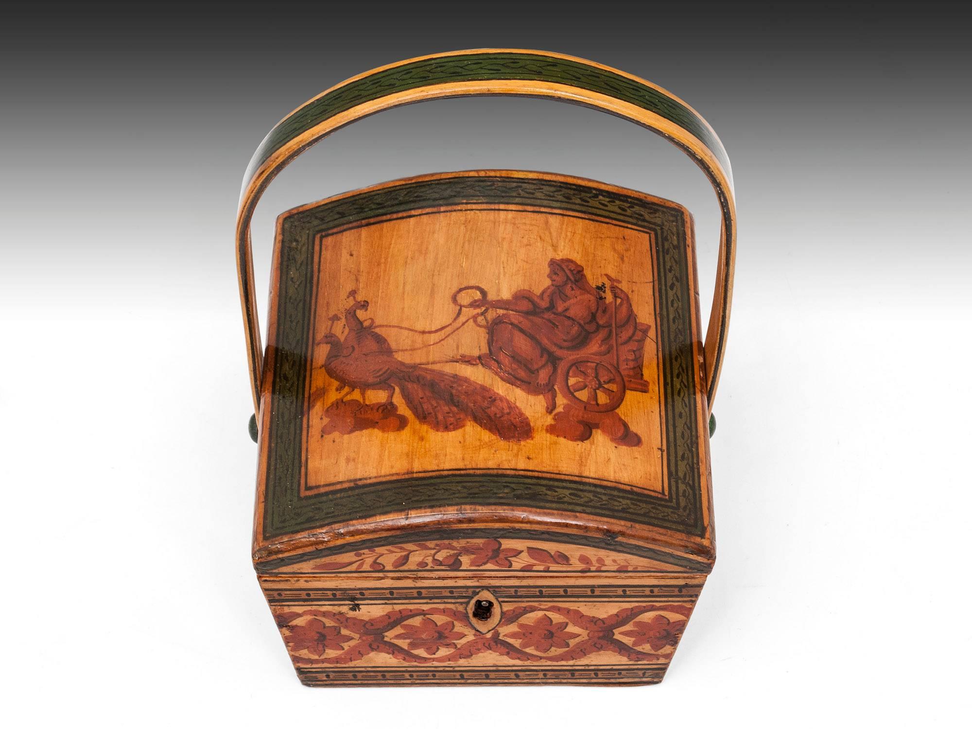 Early antique tunbridge sewing basket decorated with floral patterns with bold lines of black and green. The top is decorated with an image of the Greek Queen of the Gods, Hera. The Goddess of Marriage, Women, Childbirth and Family, depicted on her