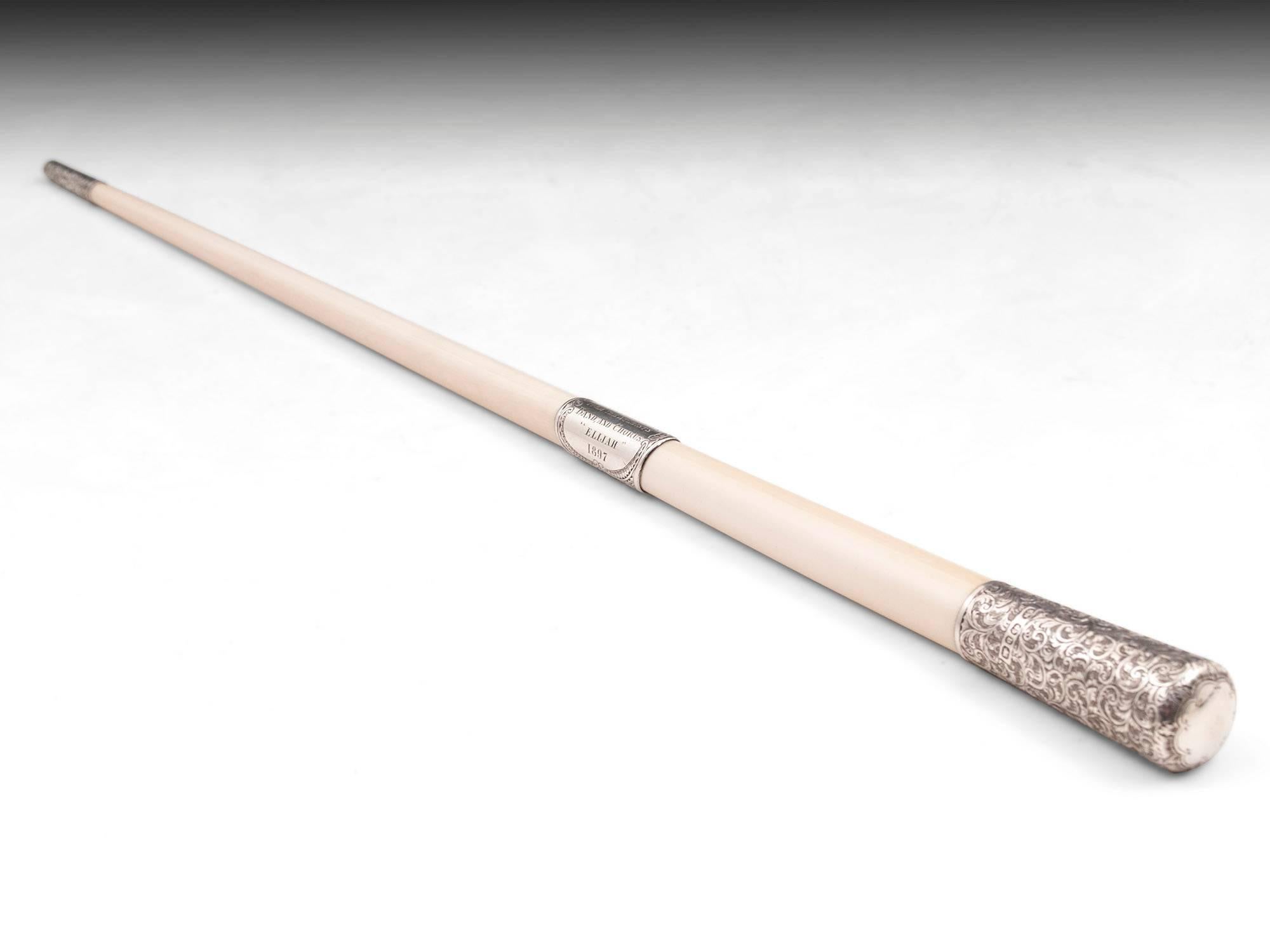 Fine ivory and sterling silver conductors baton by silversmiths Ebenezer Newman. This very impressive ivory conductors baton has beautiful exquisite hand-engraved silver mounts to the top, bottom and middle. The middle section of the conductors