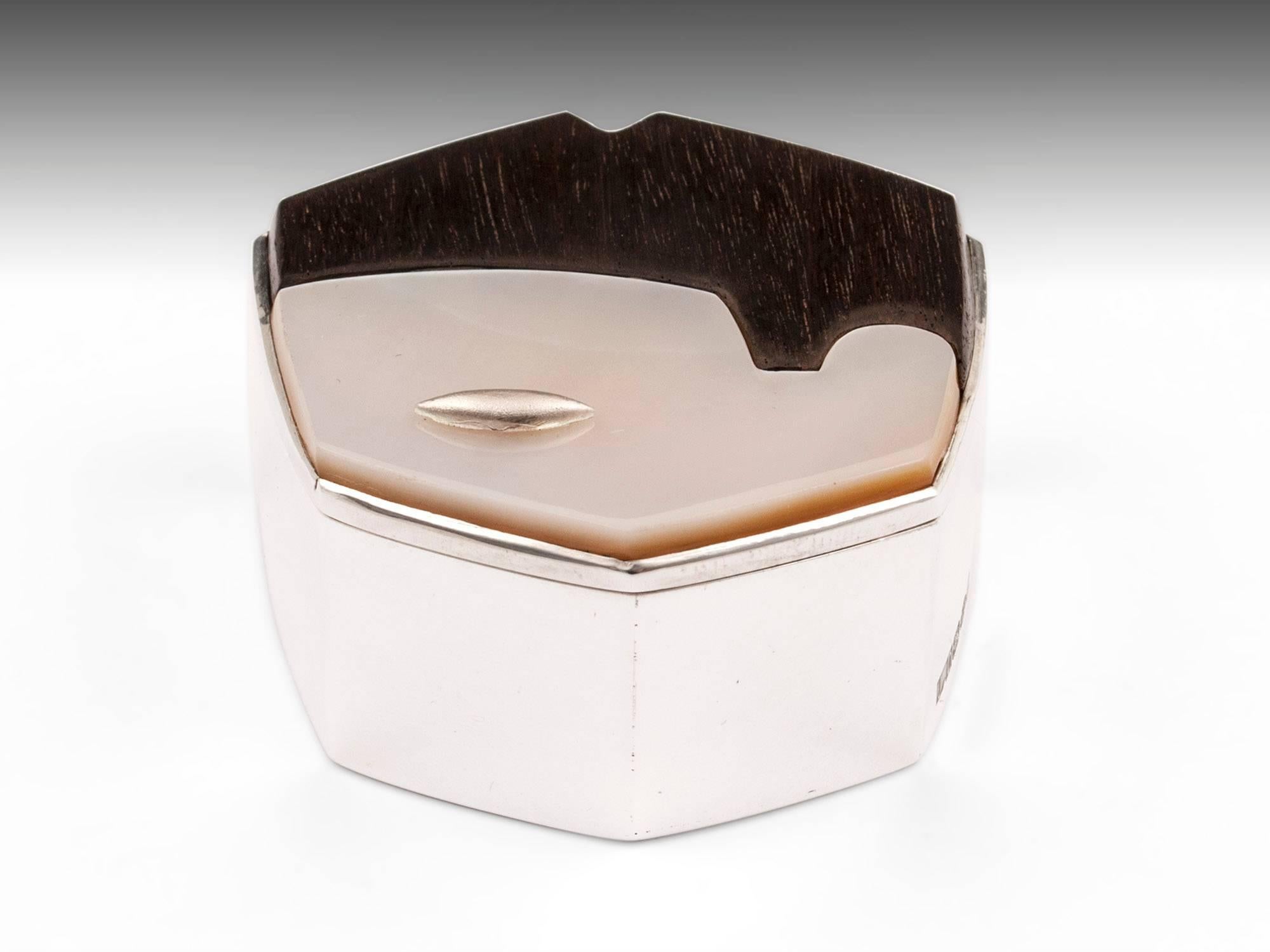 James Dougall shibayama face boxes.
The new face boxes by James Dougall, the latest pieces by this award winning contemporary designer silversmith are the fusing of Shibayama, an ancient Japanese carving and inlay technique with modern European