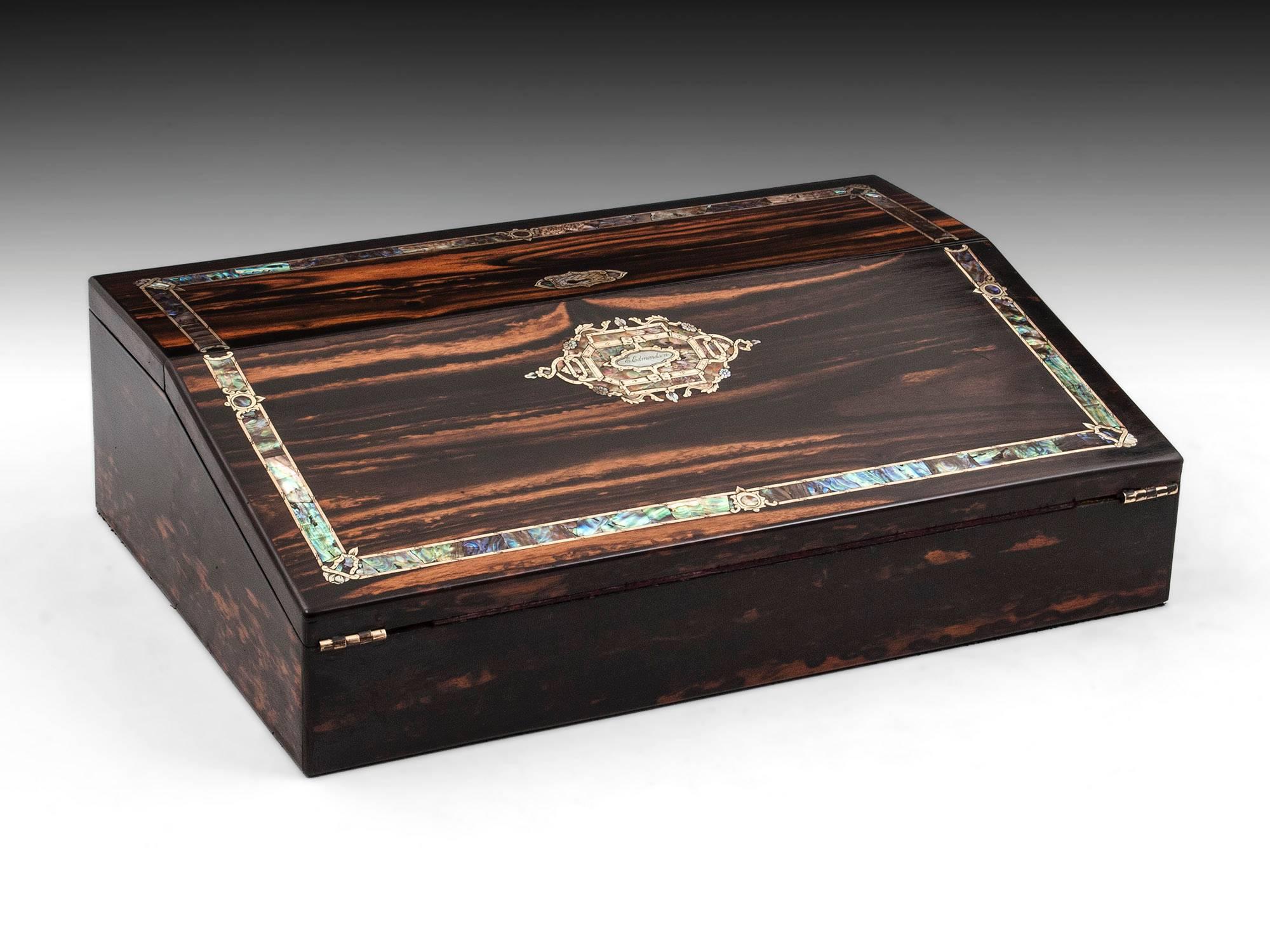 Exquisite coromandel writing box with beautiful engraved brass and abalone pearl border running around the top edge of the box, the intricate initial plate has a tinge of pink abalone shell. The mother of pearl is inscribed with the name E.
