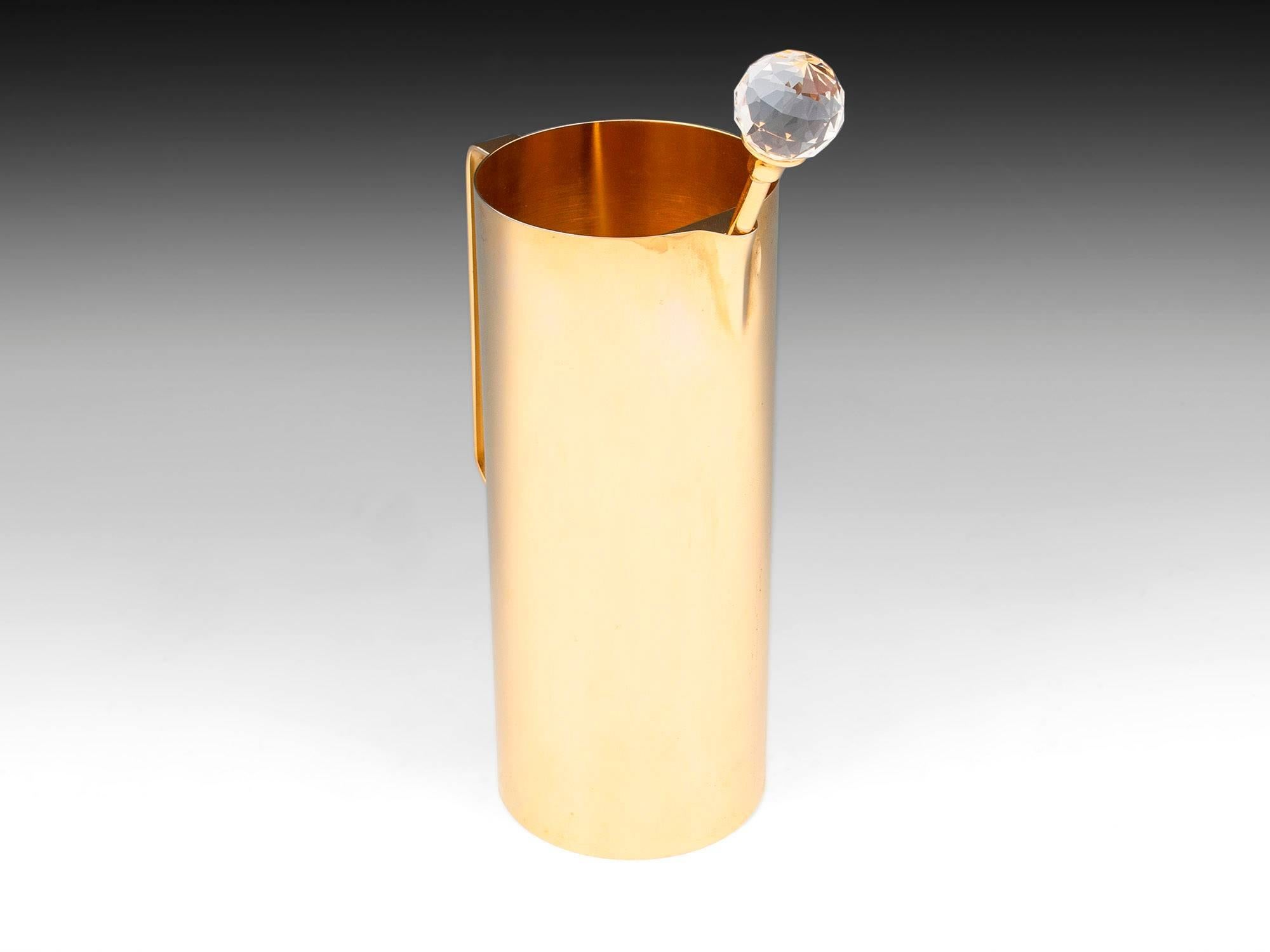 Striking vintage gold-plated solid brass cocktail pitcher by Valerio Albarello, Italy. 

Complete with its original Swarovski crystal topped stirrer.
 
