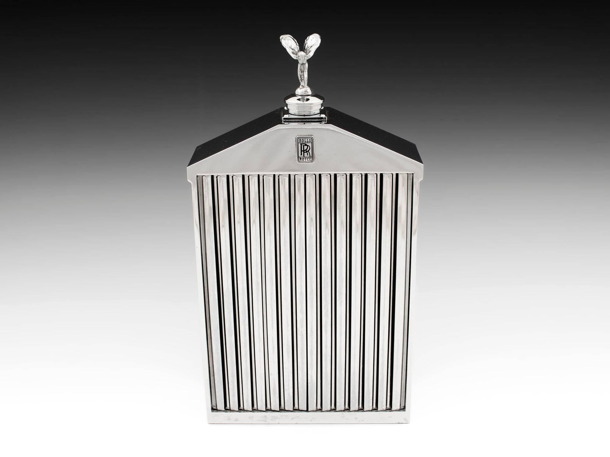Rolls Royce decanter. 

This Rolls Royce radiator shaped decanter made by Classic stabile. 

These were sold by high retail establishments such as Harrods of London, UK, in the 1960s 

The Rolls Royce Decanter has a heavy chromium-plated