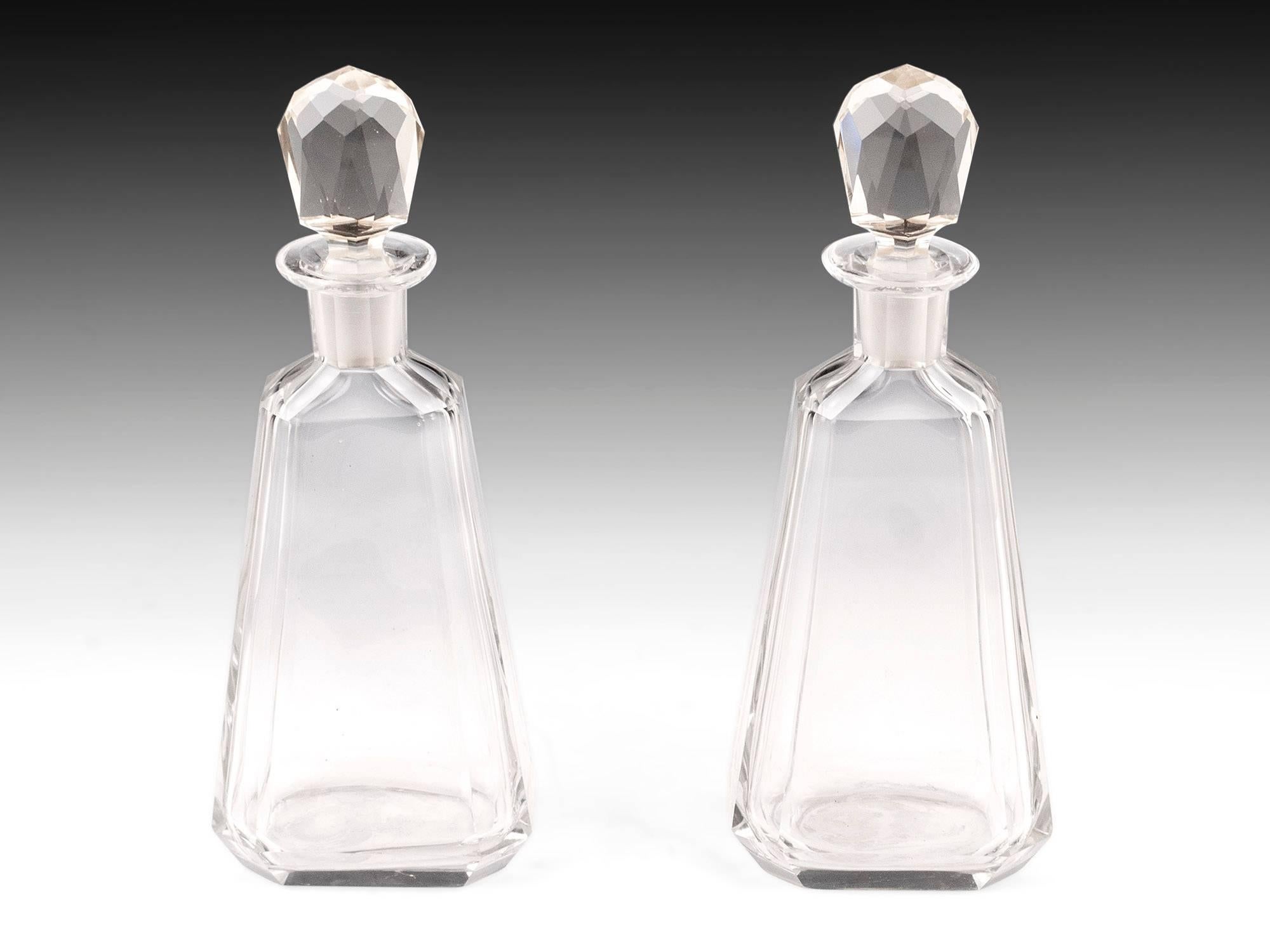 Pair of beautifully shaped Art Deco glass Decanters with faceted stoppers.