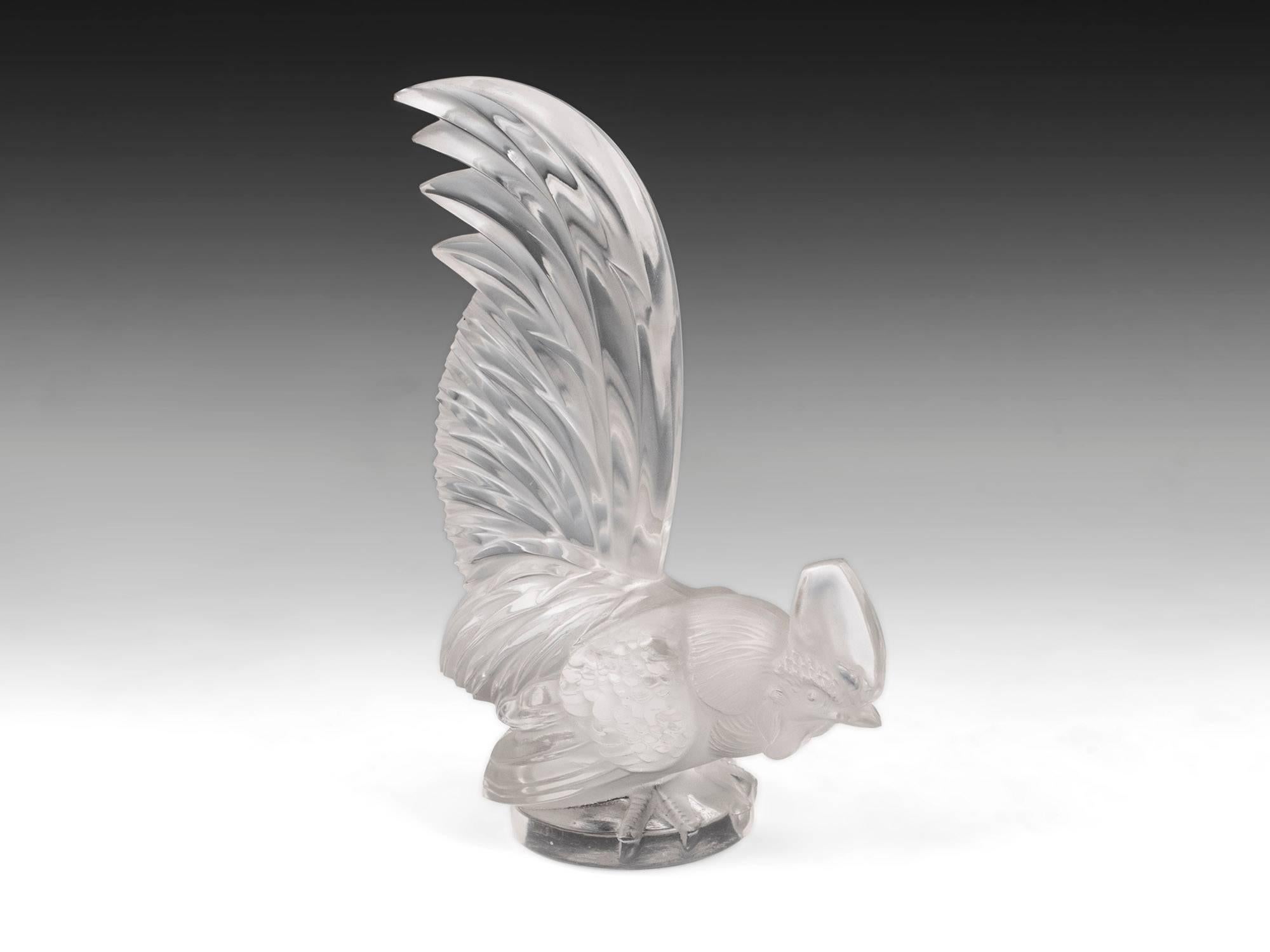 Lalique Coq Nain / Cockerel car mascot. Model number: 1135
These were originally made as car hood ornaments in the 1920s by famous glass make René Jules Lalique, who started a company using his own name, which still creates fine glassware today.