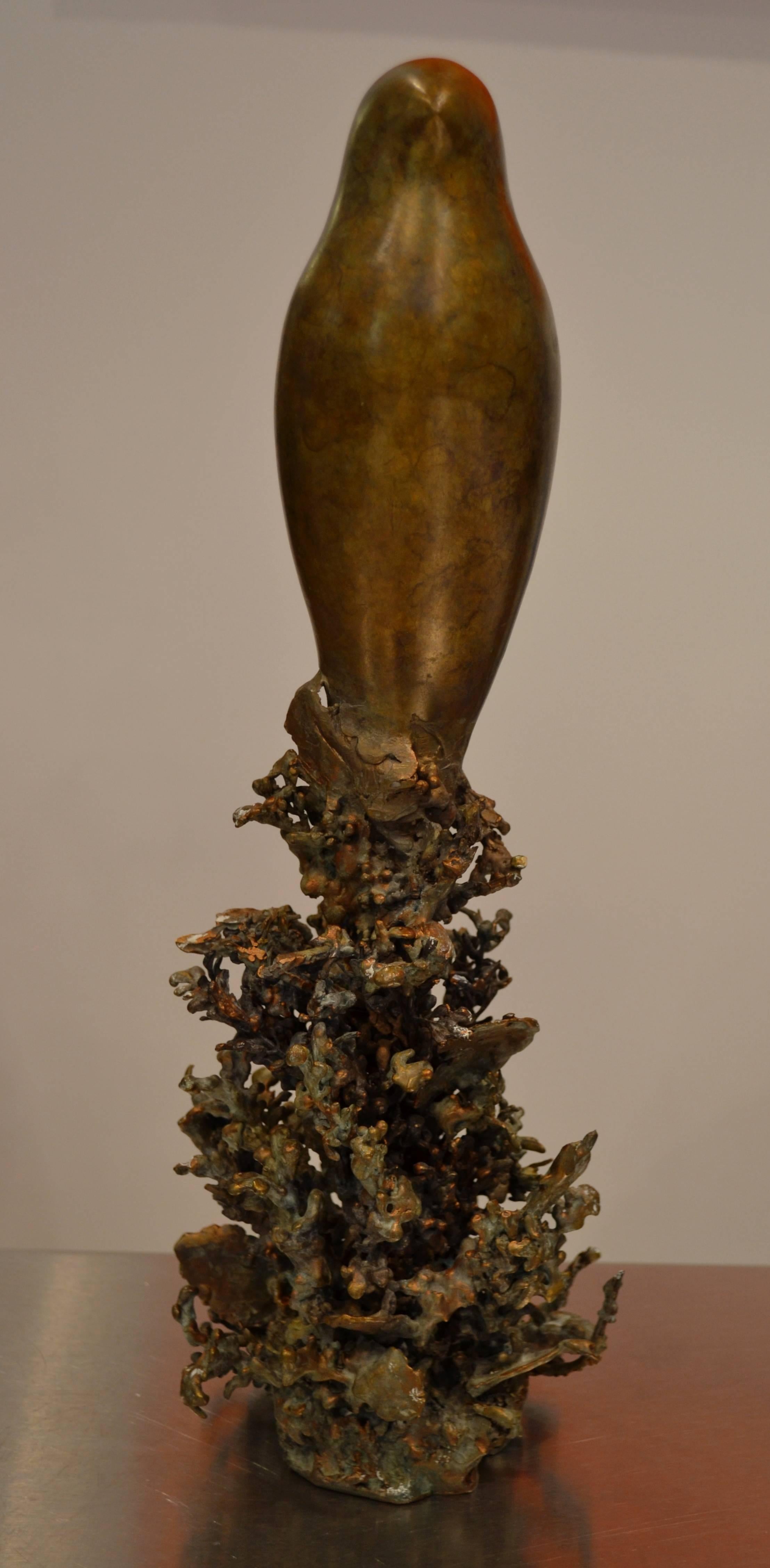 Bronze bird abstract sculpture titled 