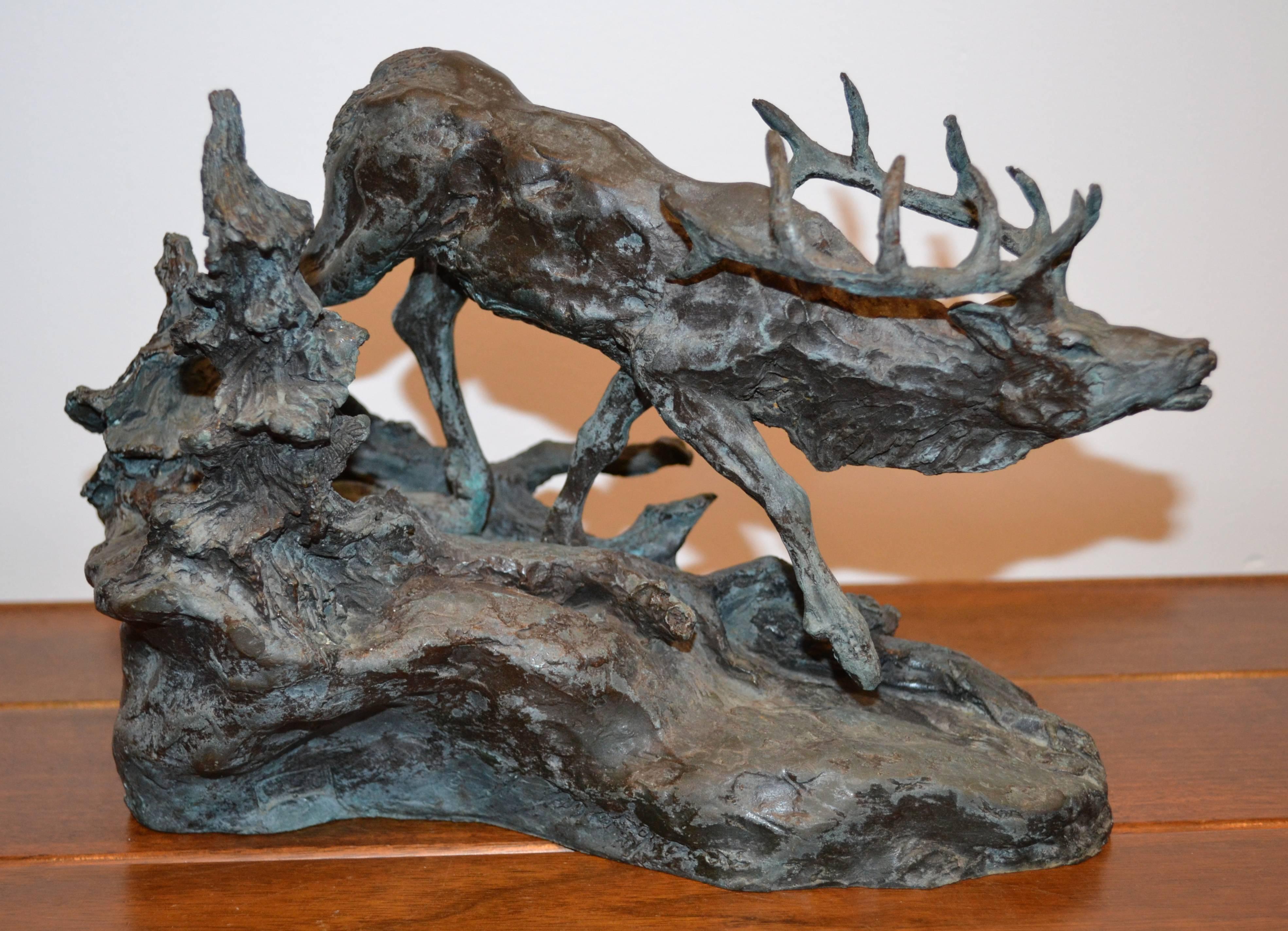 Cast iron standing stag or deer, sculpture, beautifully cast with a gorgeous gray patina. Signed by artist, 1972.