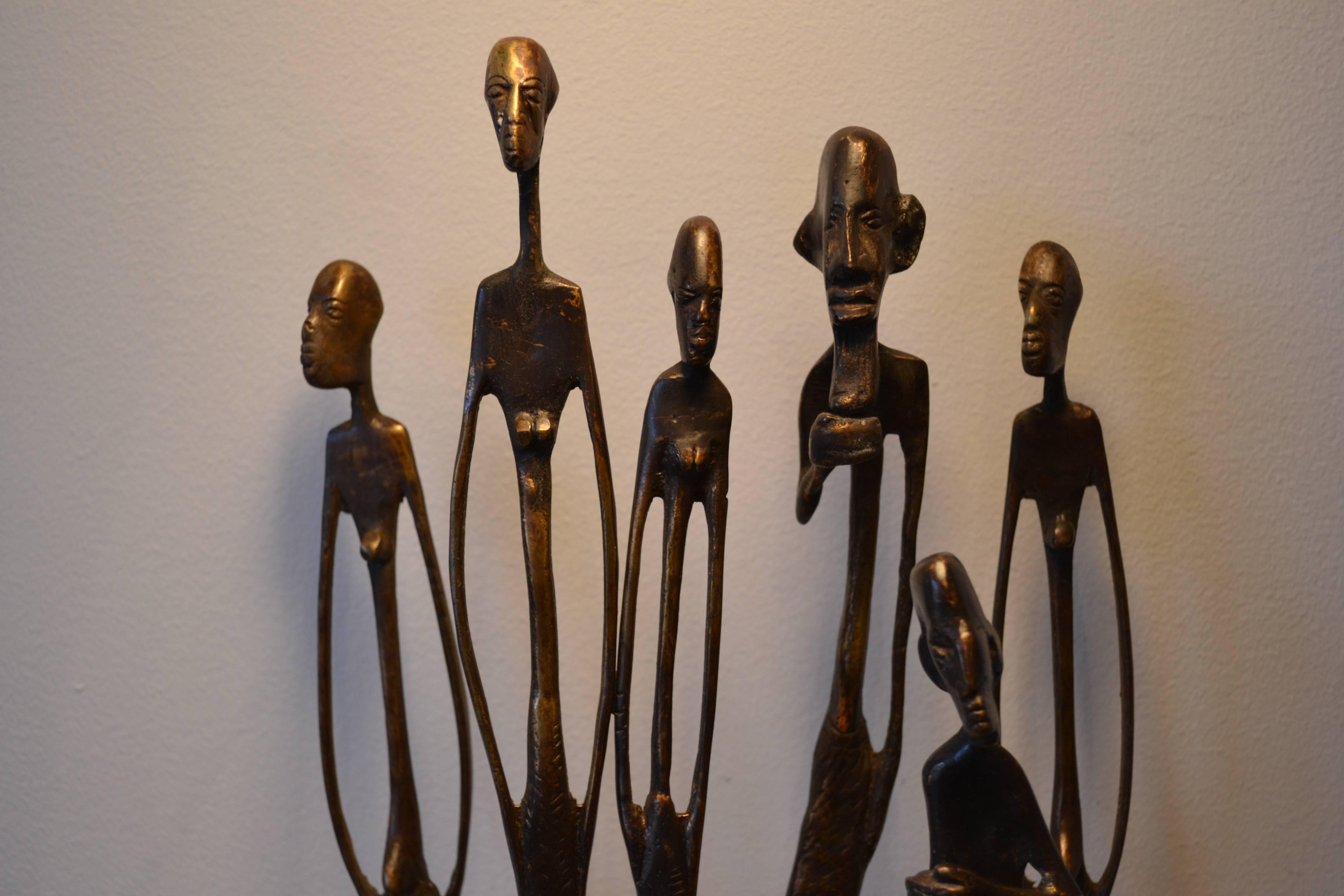 Abstract sculptures. Group of four bronze Mid-Century Modern figures, all with beautiful patina.