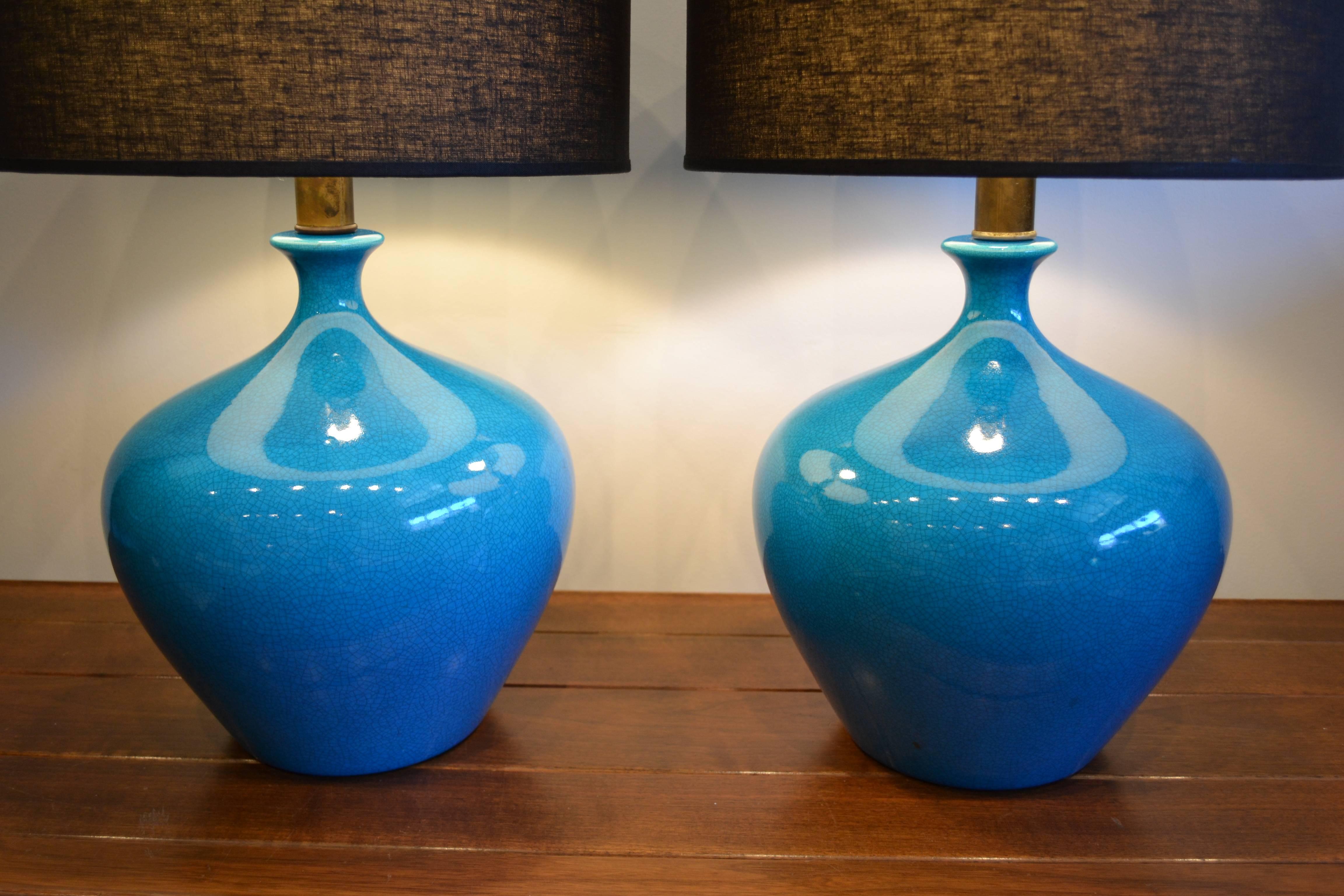 Exceptional massive  pair of glazed Mid-Century Modern tourquoise blue ceramic table lamps, beautiful crazing pattern within glaze.  VERY vibrant in color.  shades not included.