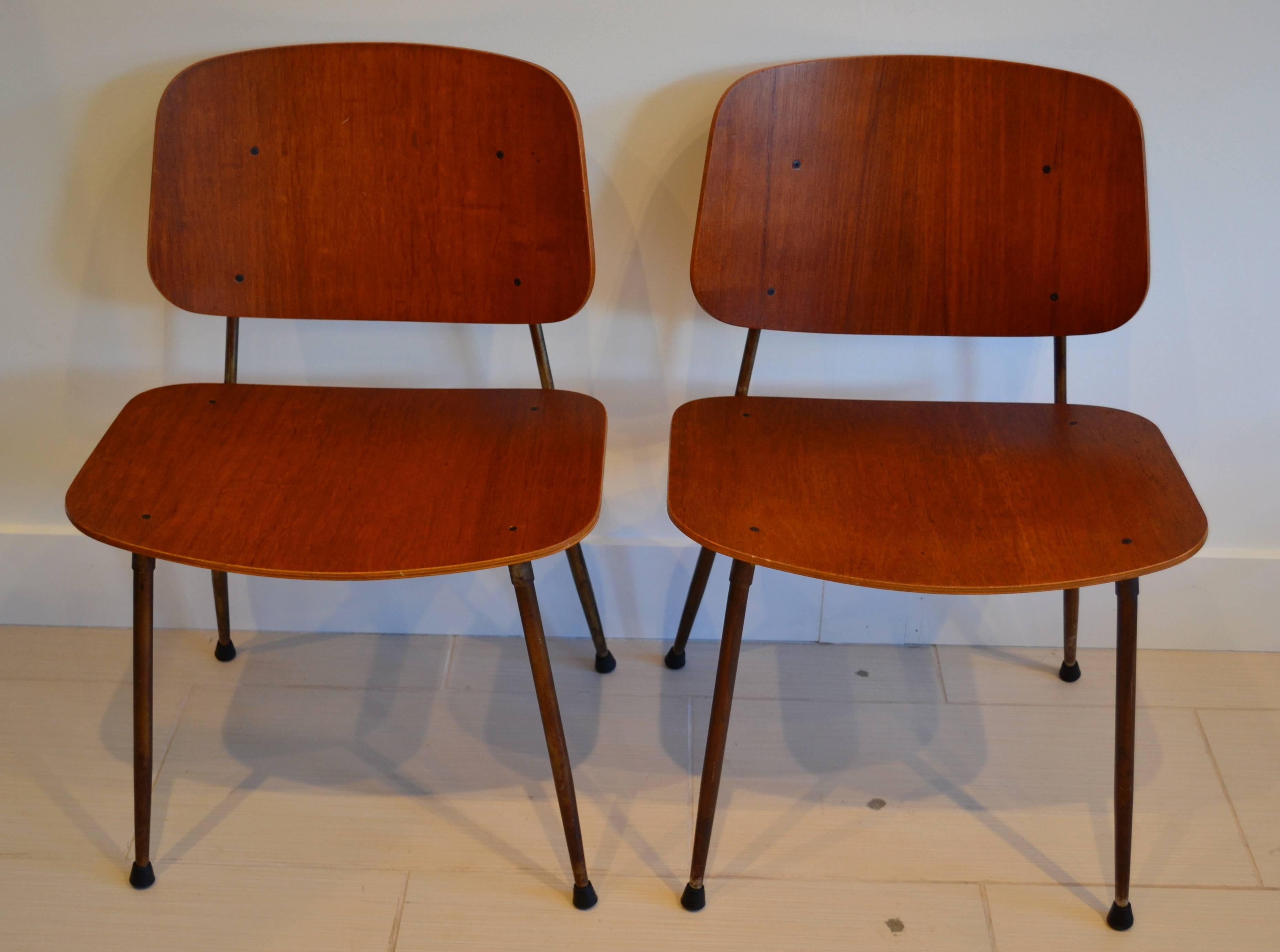 Very sleek side chairs designed by Borge Mogensen, manufactured by soborg mobelfabrik, Denmark, 1950s. Teak on steel frames.