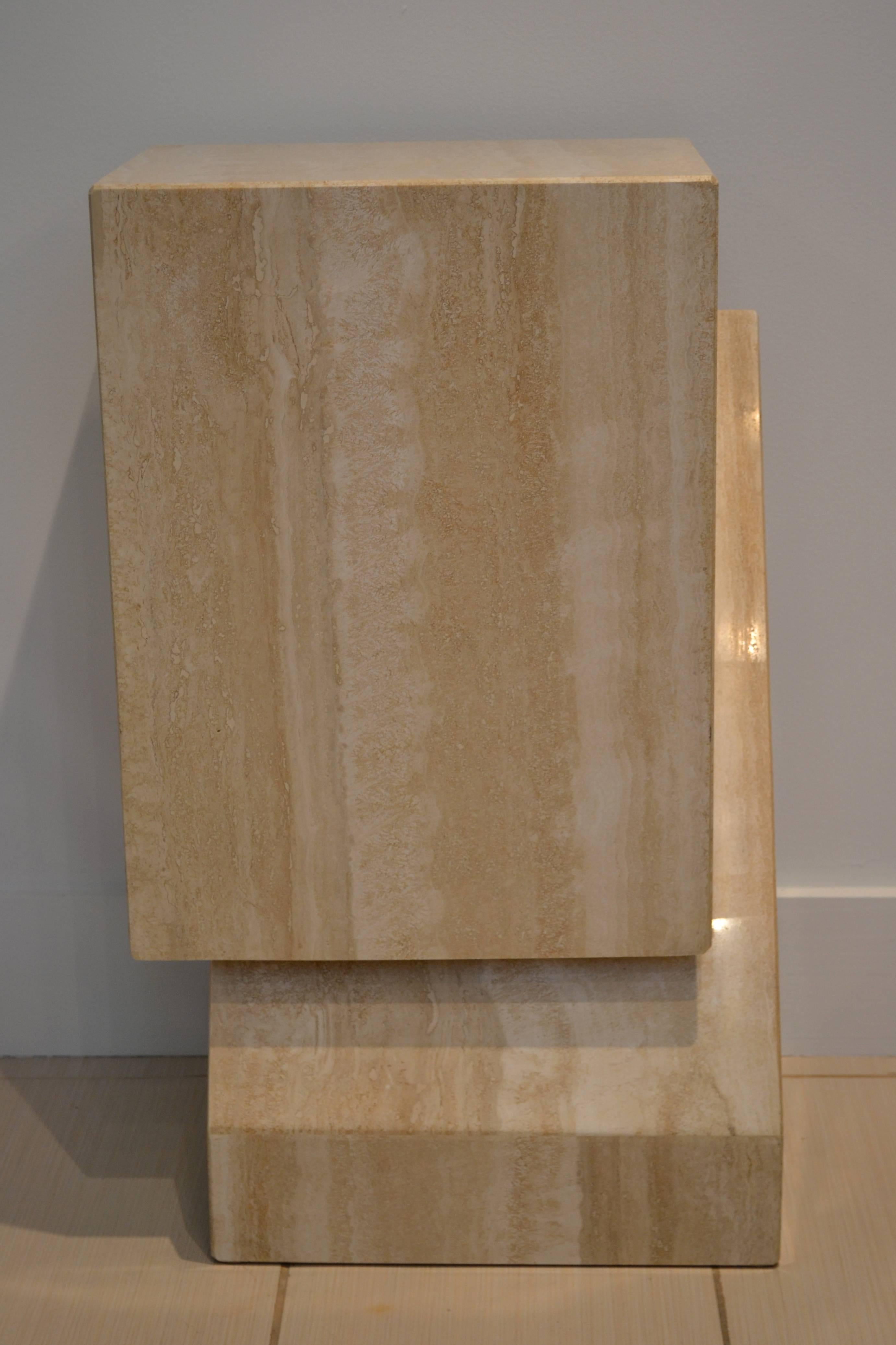 Very cool travertine pedestal or side table that also shows well as a sculpture. Hollow but very heavy, 1990s.