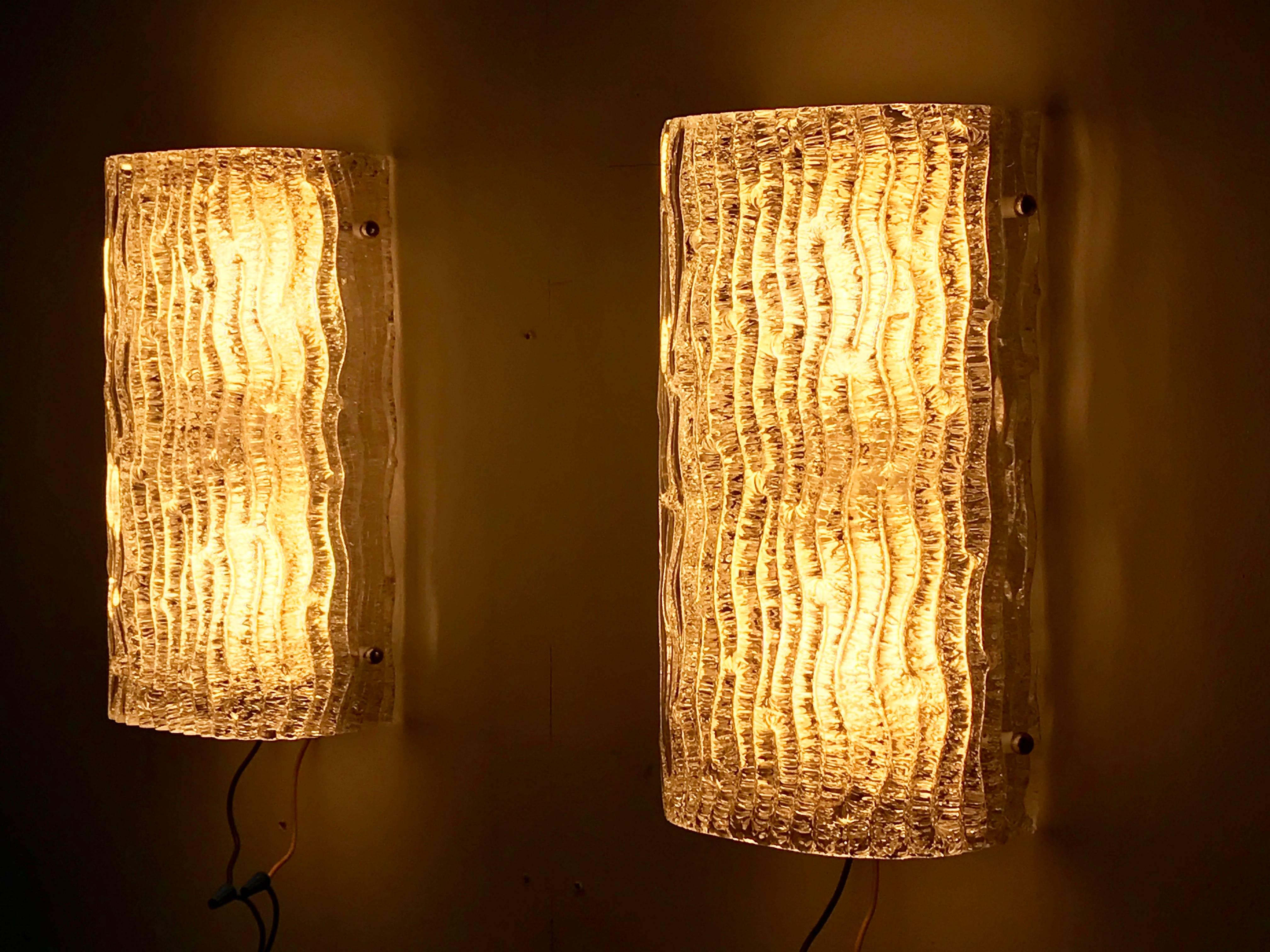 Beautiful pair of 1950s ripple glass sconces or wall lamps by J.T. Kalmar, Vienna, Austria.