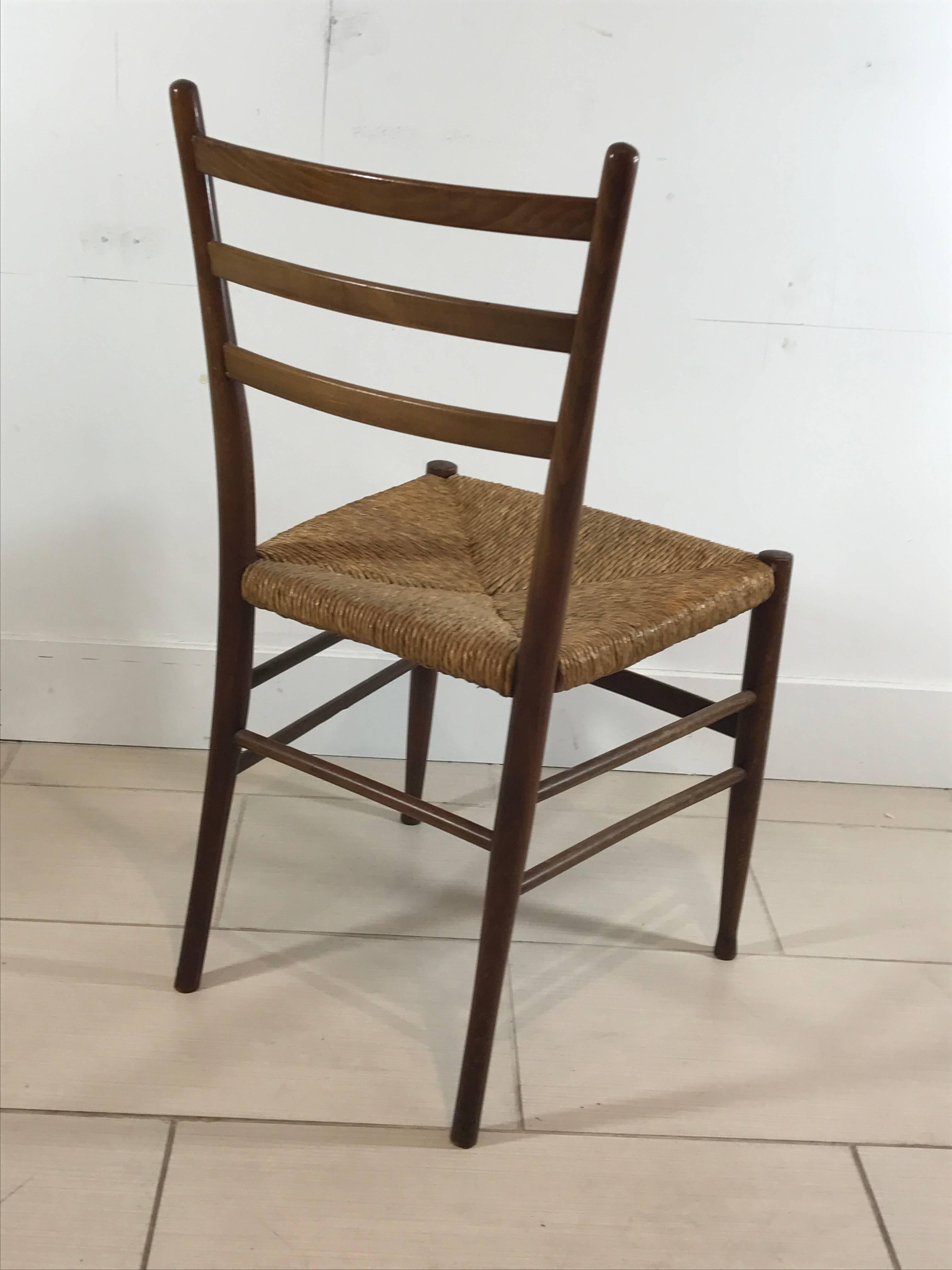 Beautiful set of six Italian woven rush caned seat dining chairs attributed to Gio Ponti, Italy. All original. 