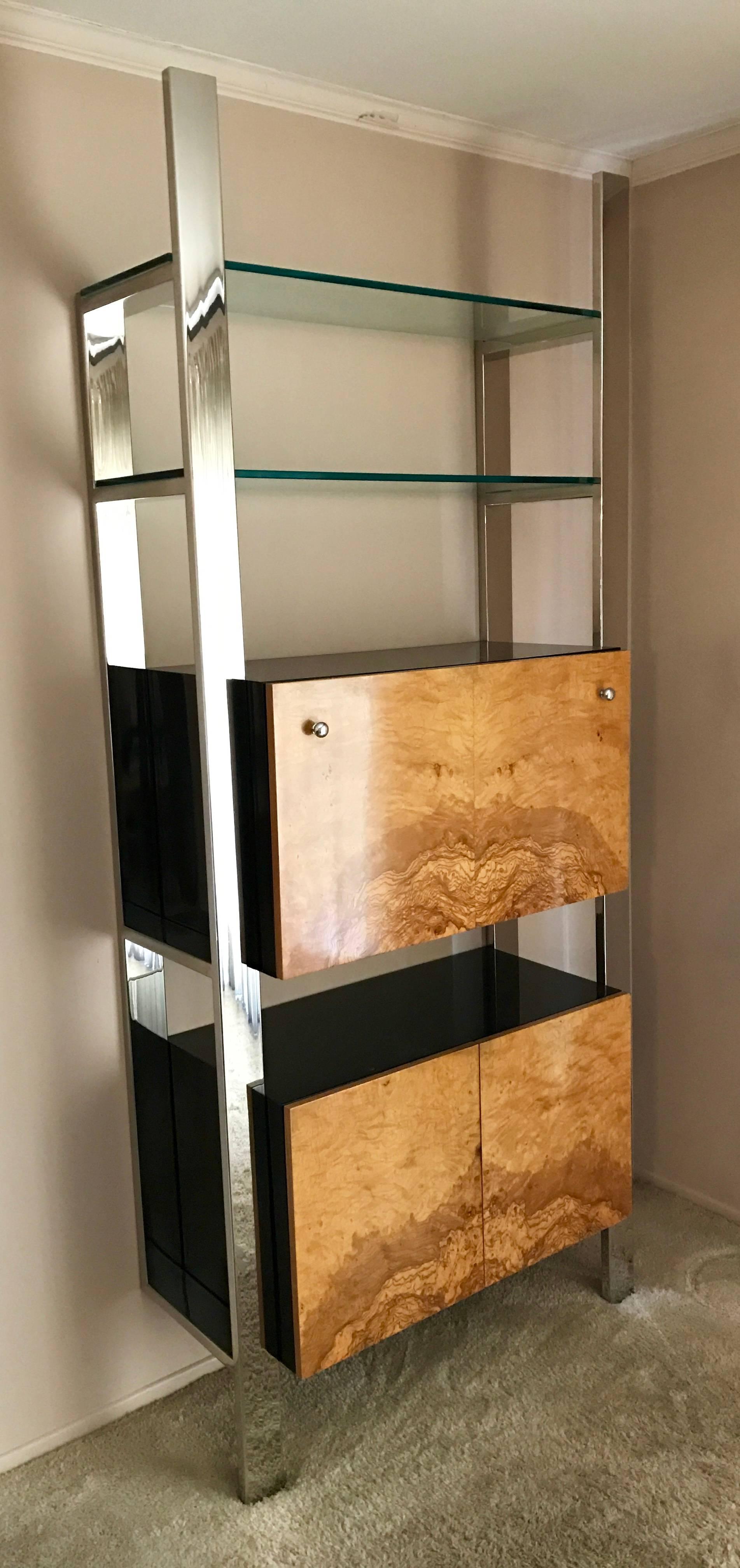Mid-Century Modern. Designed by Milo Baughman for Pace Collection. Mirror polished stainless steel frame, burl wood bar cabinet and shelf storage cabinet, two glass shelves. Perfect for entertaining. Simply stunning and perfectly sized for any room.