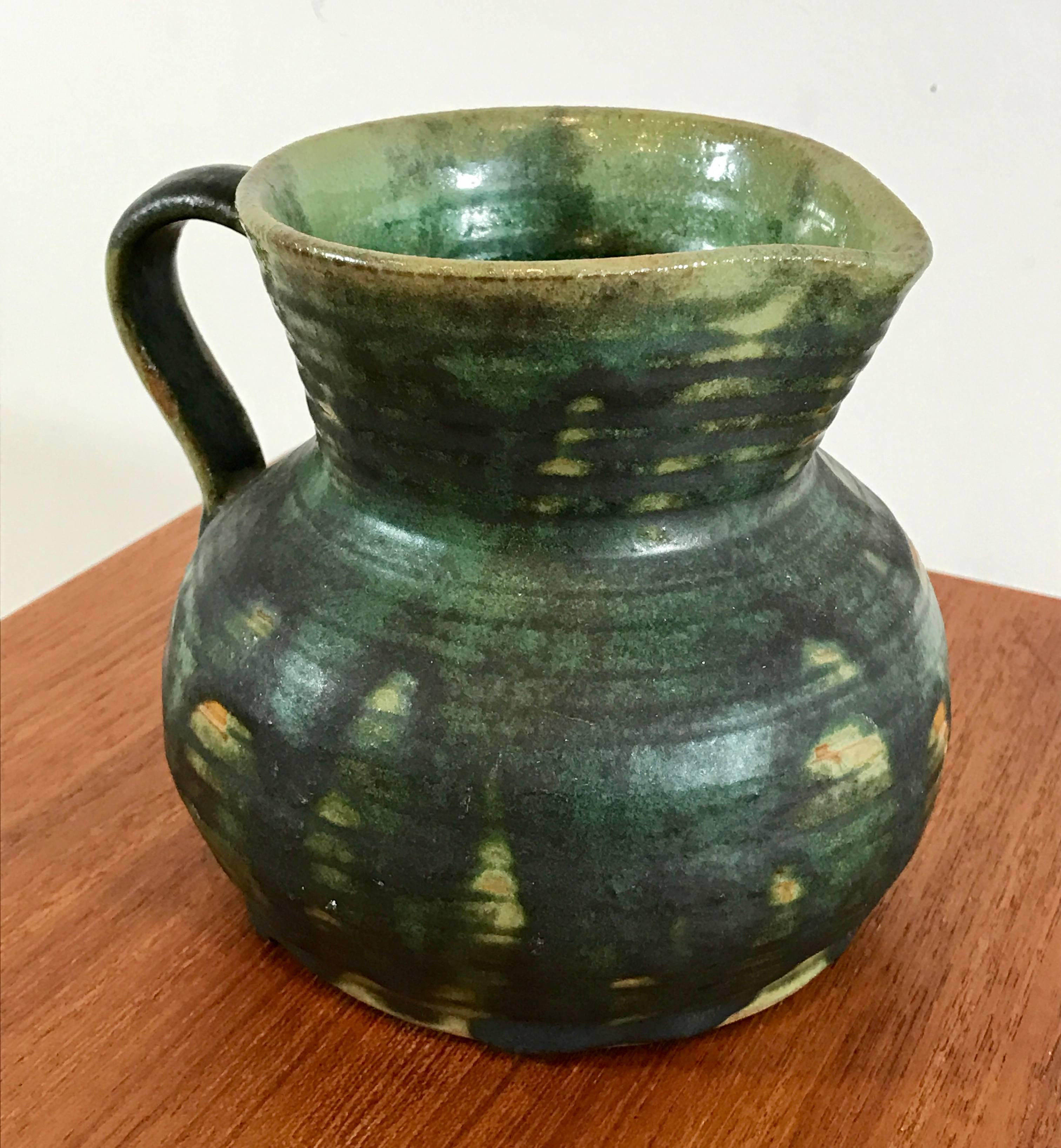 small ceramic pitcher