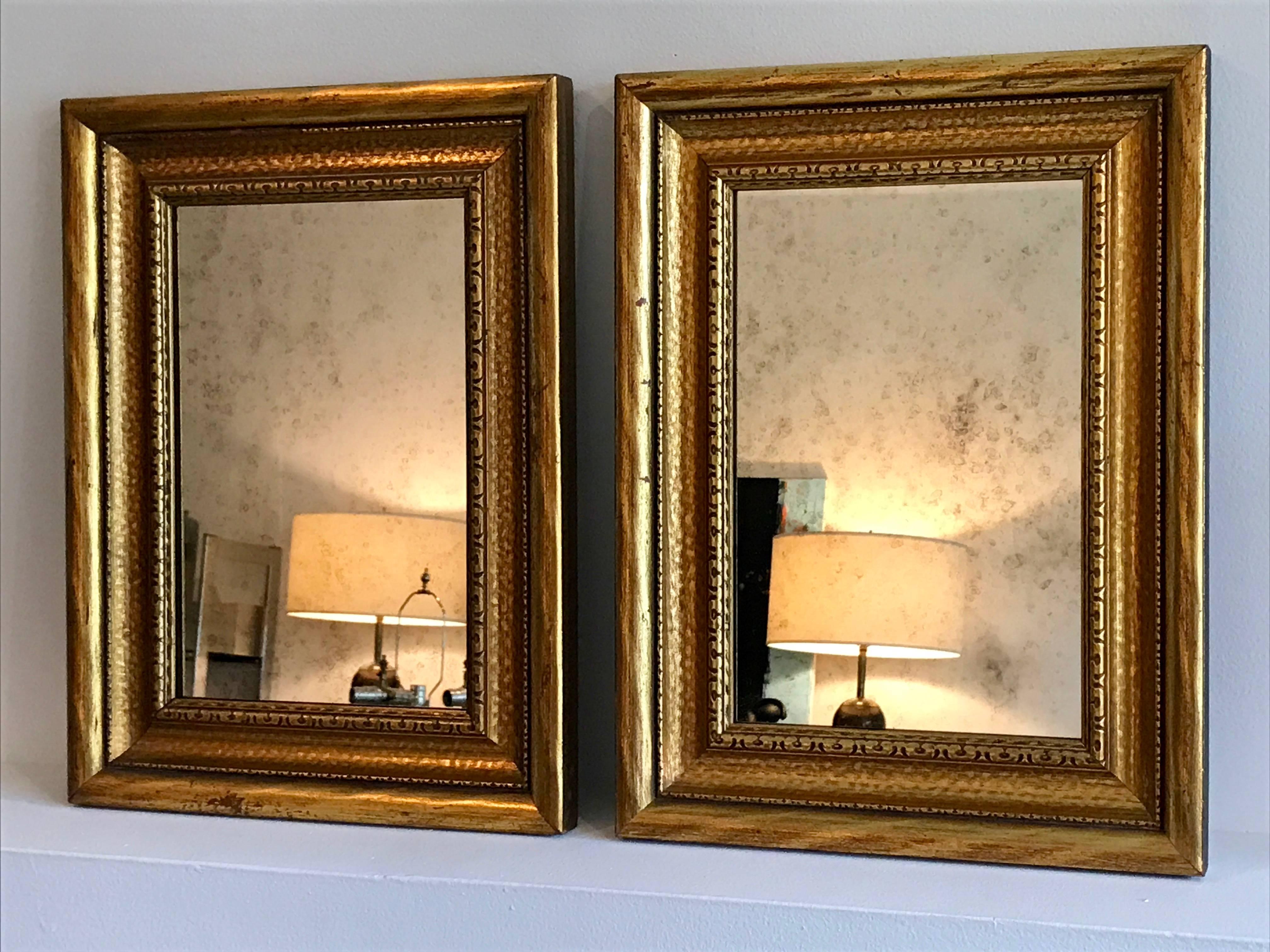 Gorgeous pair of gilt-wood Frames with silver antiqued mirror. Can be mounted vertically or horizontally. Please see photos to see the beautifully aged mirrors. 