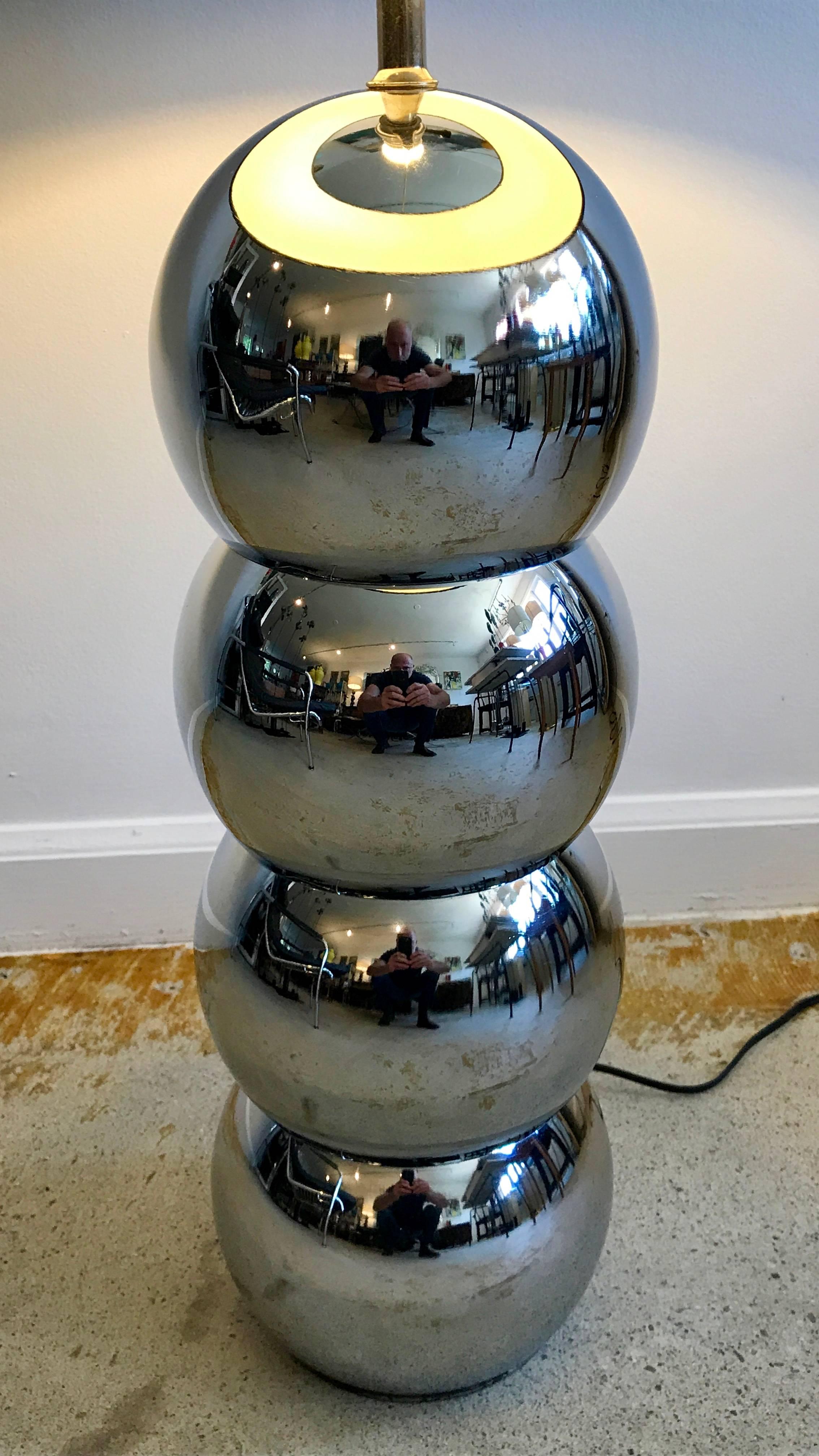 Iconic pair of chrome stacked ball table lamps by George Kovacs, 1970s. Minor pitting but hardly noticeable, tiny crease on one ball, see photos. Re-wiring recommended, shades not included.