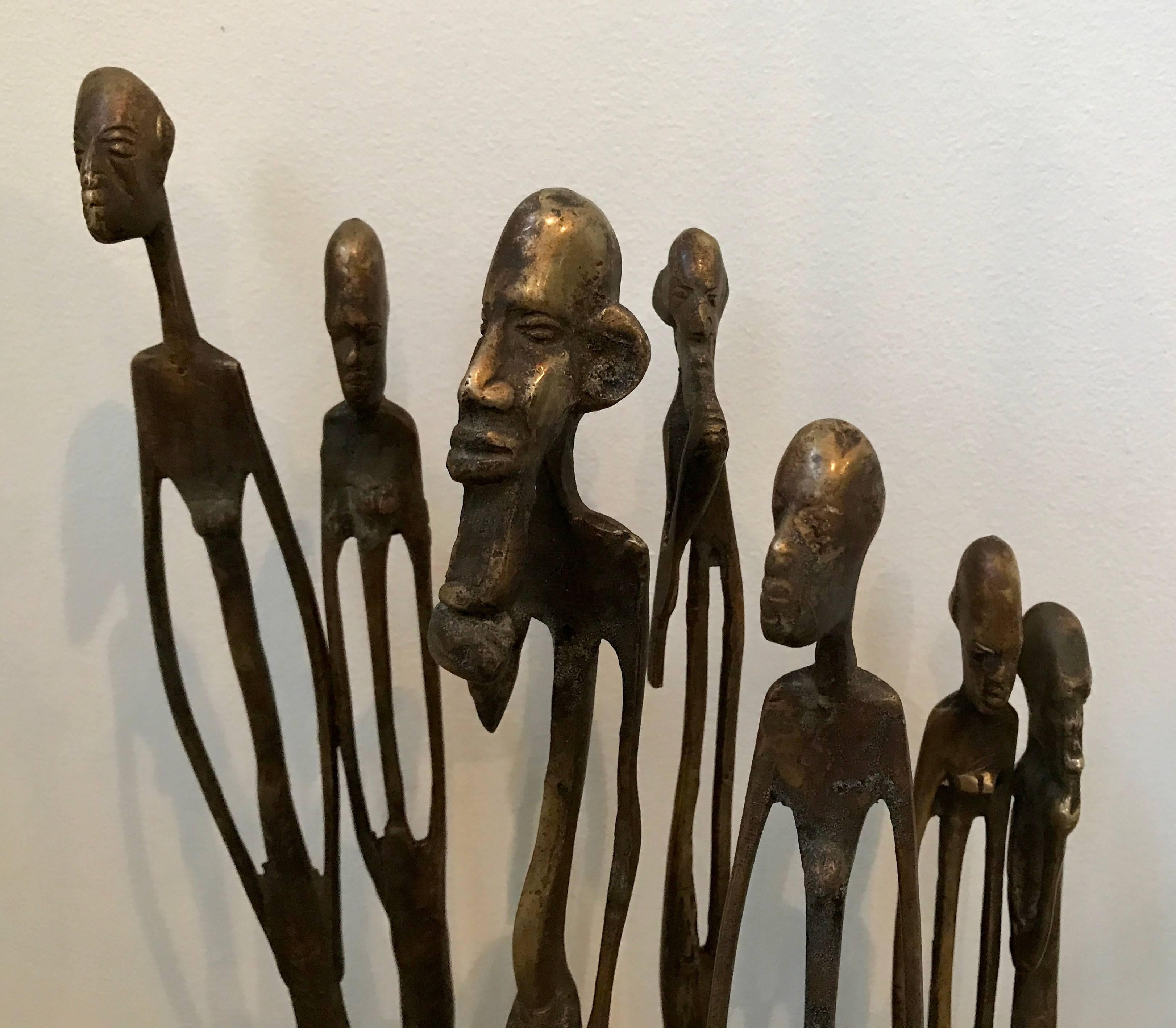 Very cool grouping of five abstract figural sculptures in the style of Giocometti, cast in bronze.