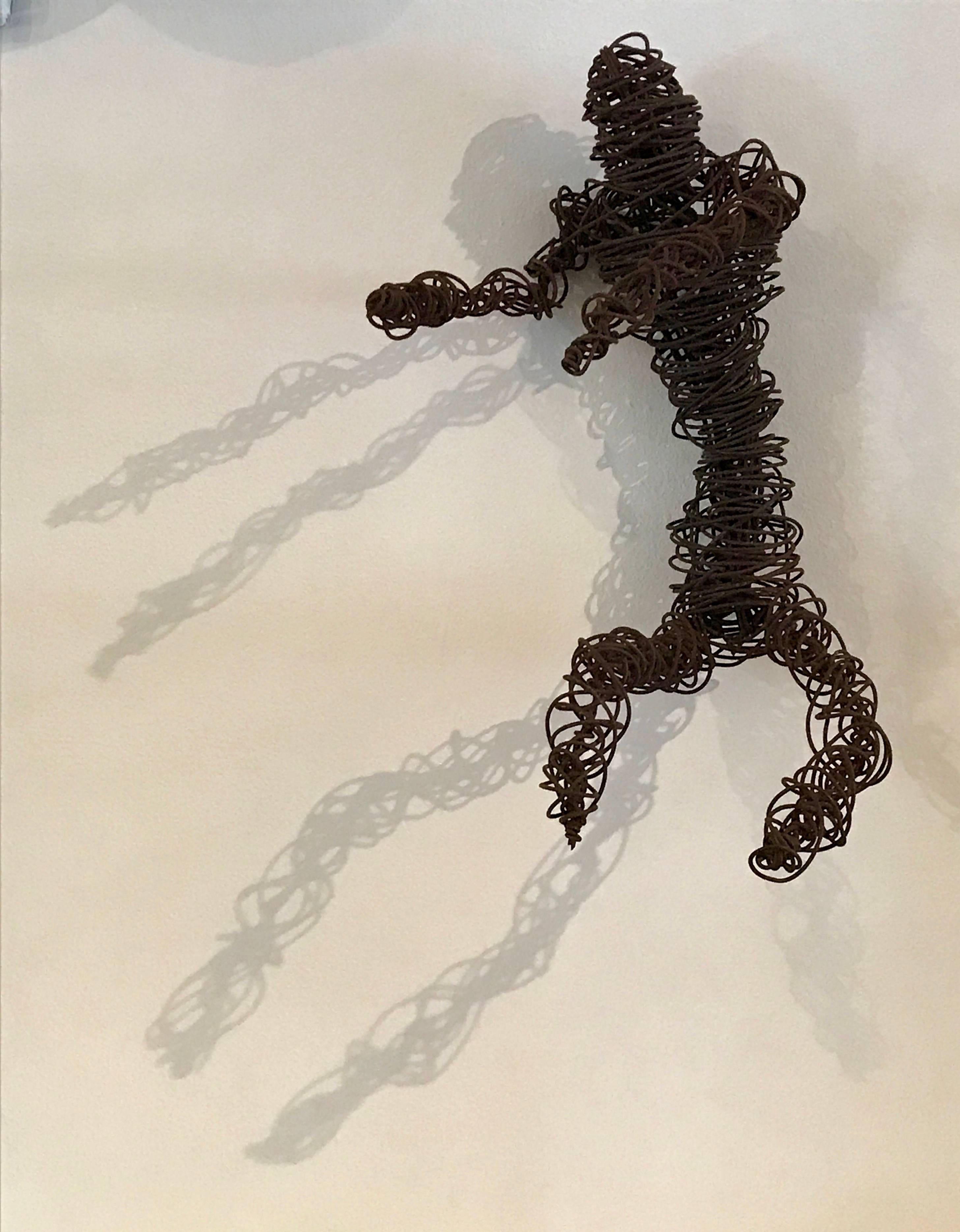 Brutalist nude male wire sculpture spun from medium gauge wire, beautiful natural patina.