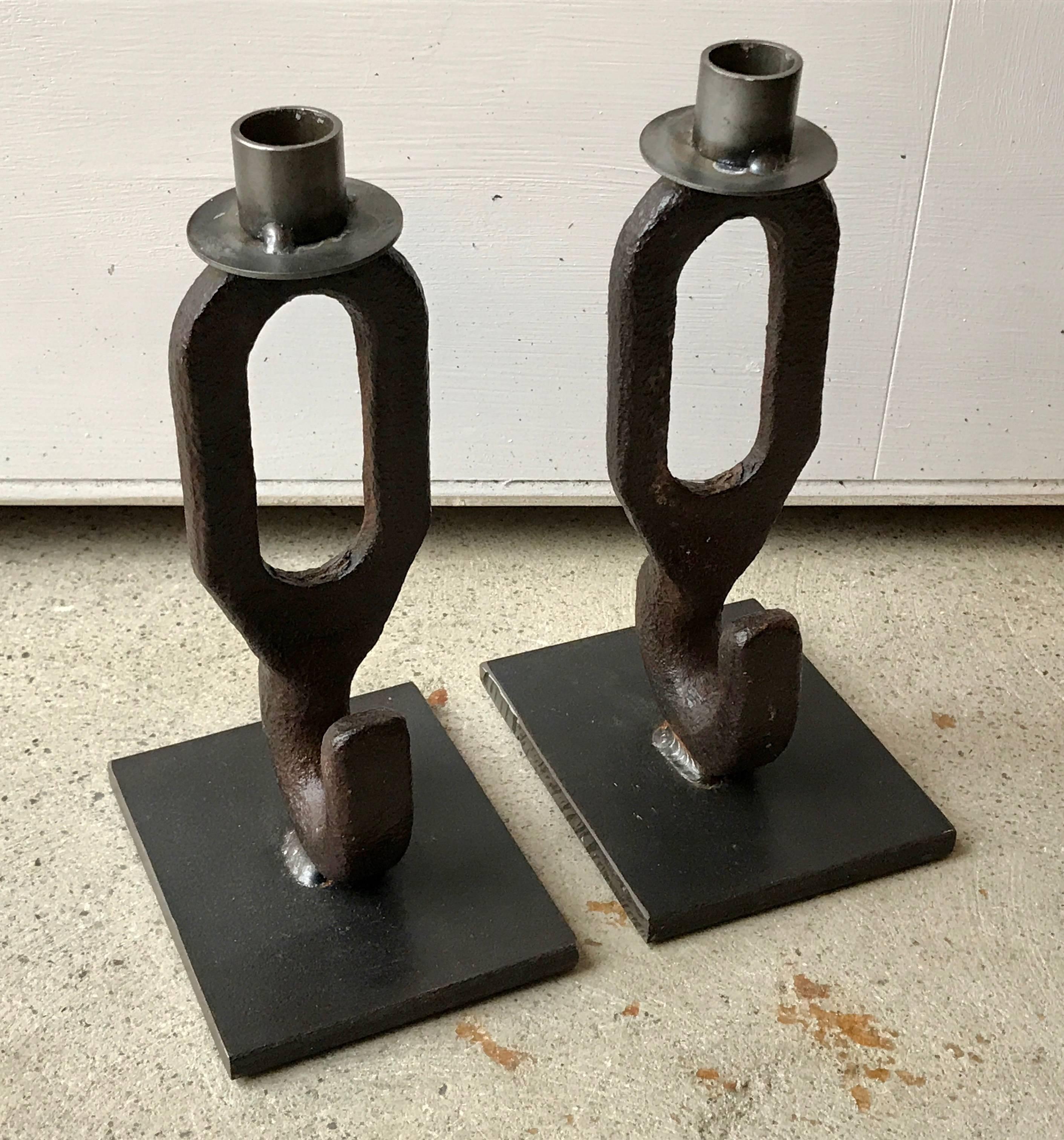 Super cool Brutalist, steam punk and industrial steel candlestick holders by Breck Armstrong. Unique and handcrafted.