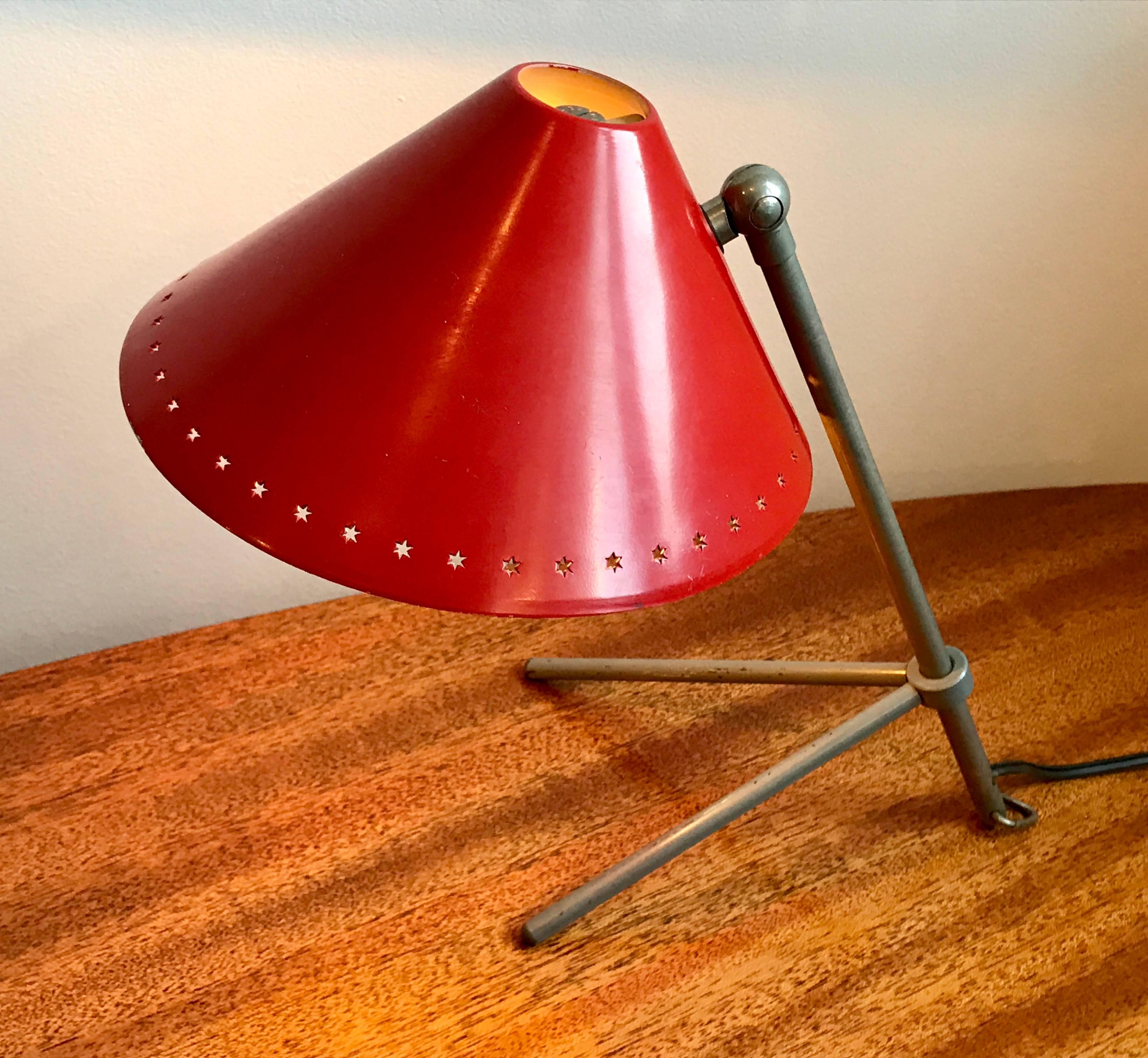 Pinocchio, table or wall mount lamp designed by H. Busquet, circa 1950.
Manufactured by Hala Zeist, Netherlands, circa 1950.
Adjustable metal tripod base, vibrant red lacquered shade.