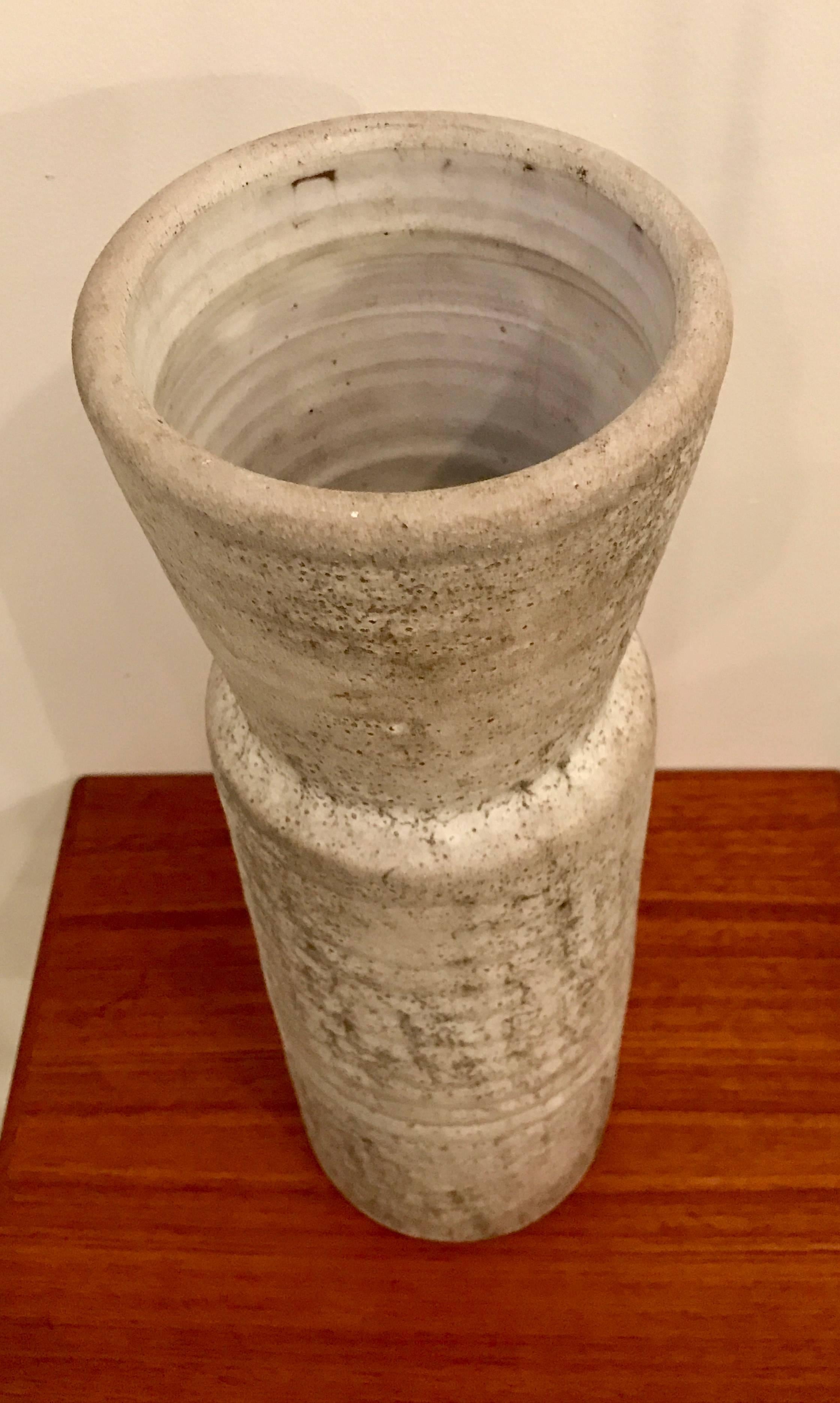 Impressive fired stoneware vessel by Mobach, Holland. The Mobach family has been producing kiln fired ceramics for over five generations. This piece is substantial in size, a beautiful sand colored with a semi matte finish.