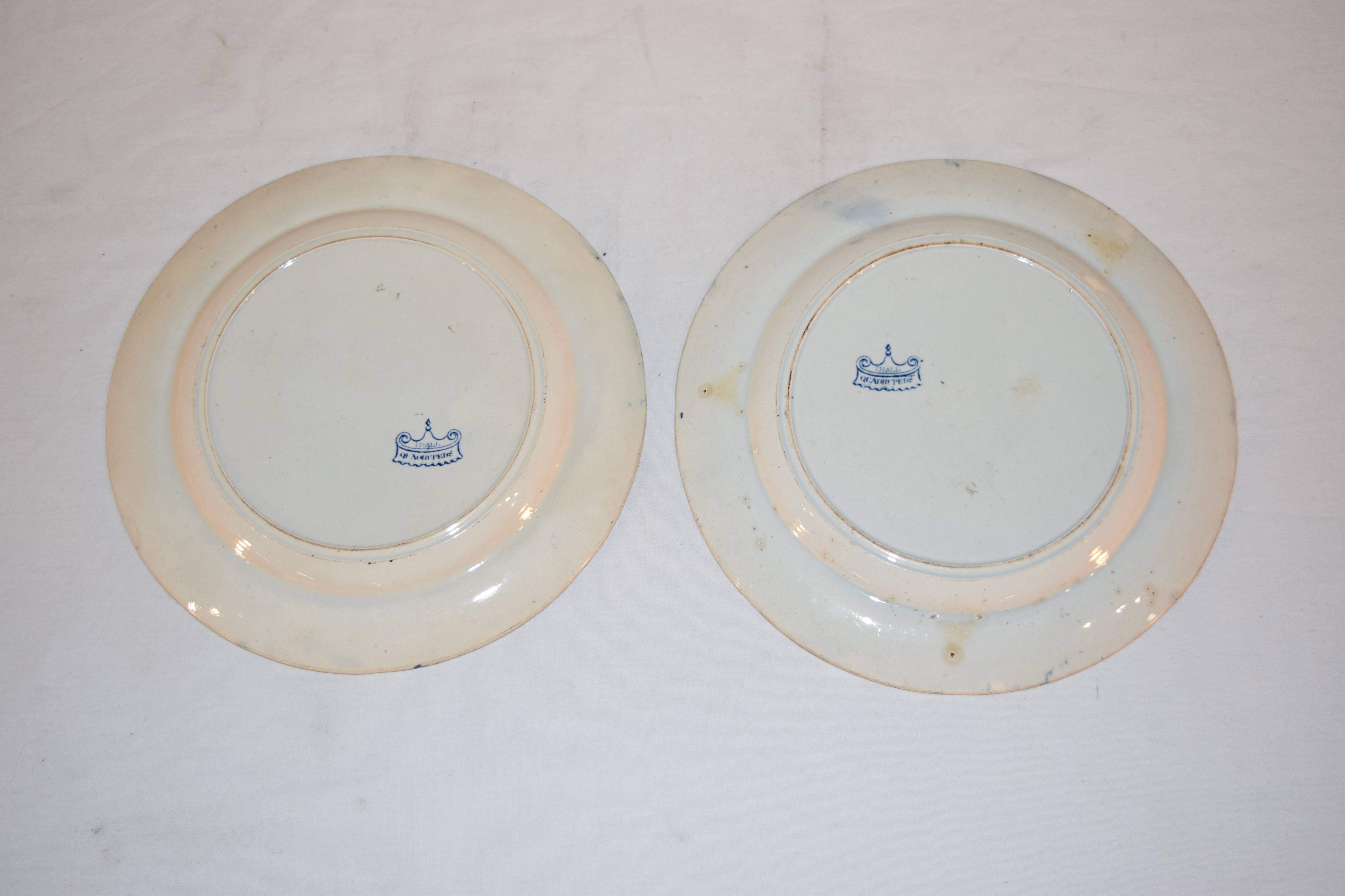 19th century dinner plates in the Quadruped series, John Hall & Sons, Burslem Staffordshire, circa 1825-1830. The central medallion has a scene of a lion and a cow.