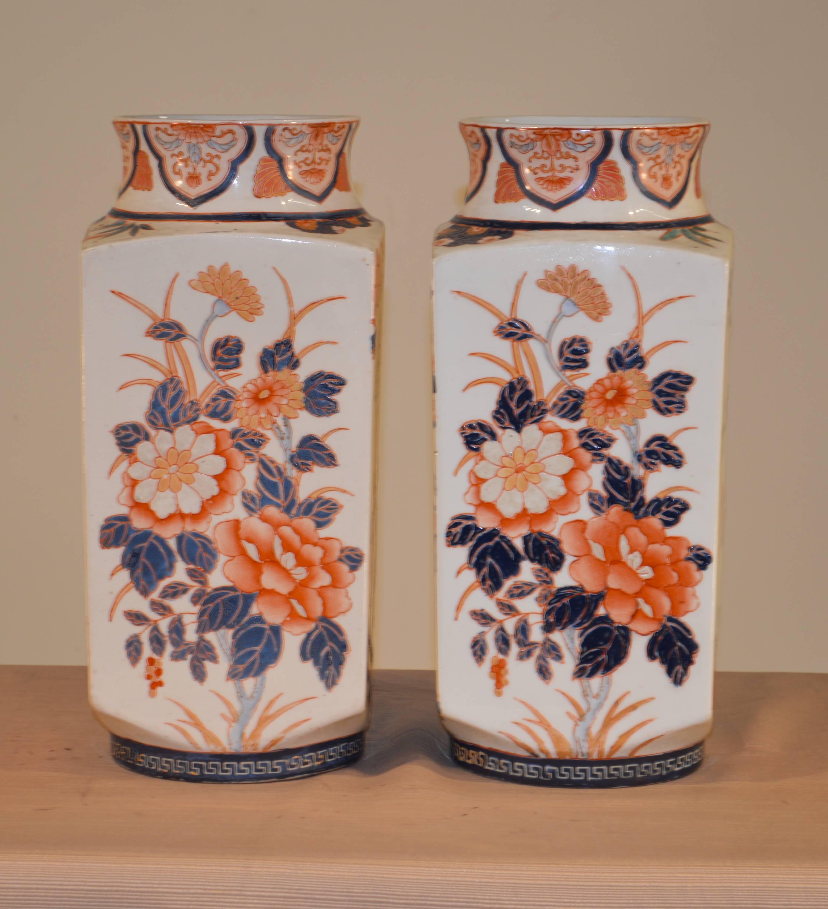 Pair of mid-20th century, English vases with hand-painted enamel bird and flower decoration. No maker's marks.