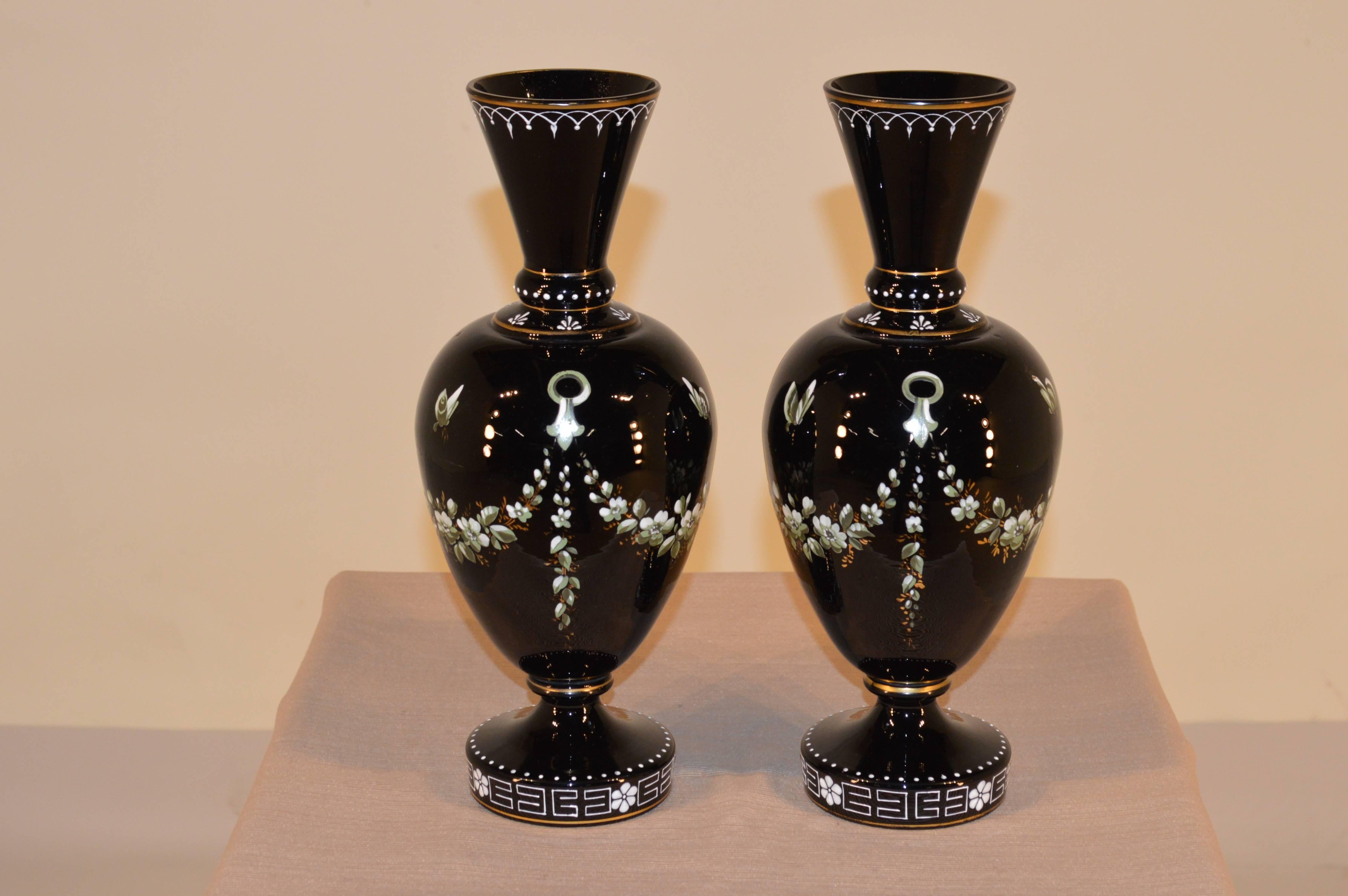19th-C. Pair of French black amethyst glass vases with hand painted enamel and gold paint decoration depicting butterflies and garland swags.