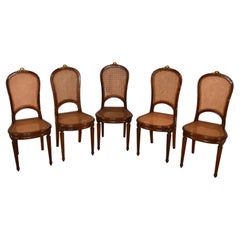 Circa 1900 Ensemble de cinq chaises d'appoint Louis XVI en noyer