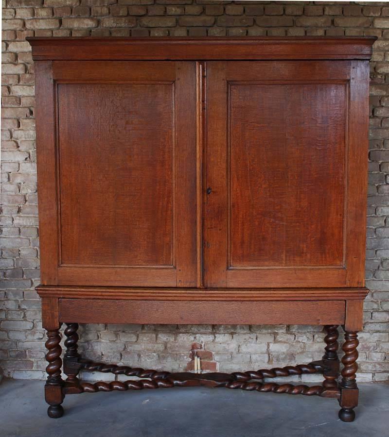 Cabinet made from oakwood
The cabinet has two doors and four drawers on the inside.
Originates Netherlands, dating circa 1780.