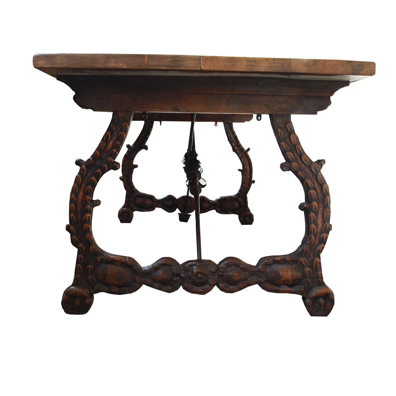 Antique Spanish table with 17th century wrought iron and walnut wood base with 19th century restored top.
Originates Spain, dating circa 1750.
(Shipping costs on request, depends on destination).
