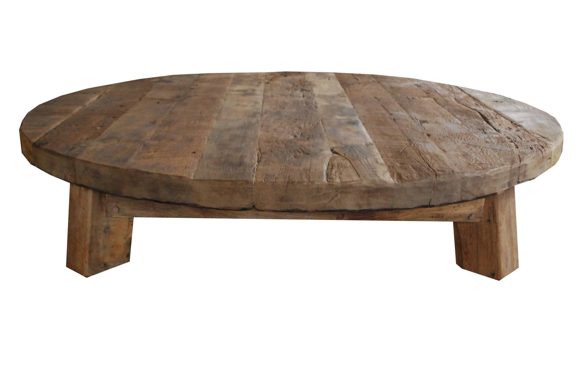 This very large round coffeetable is made from reclaimed oak beams. 
It was made during the 1960's in Veldhoven the Netherlands by Piet Rombouts & Sons. 
They were well known in the Netherlands for both their antique as well as their new furniture